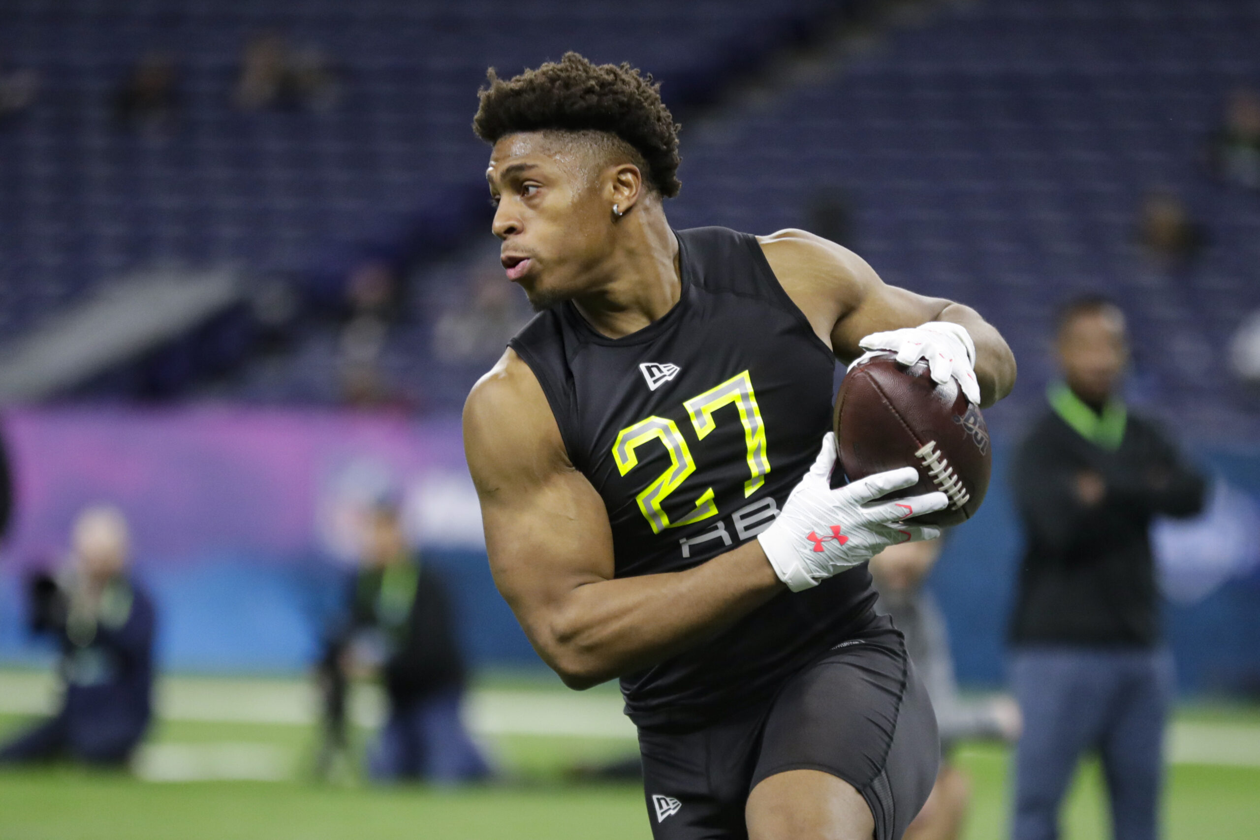 Wisconsin running back Jonathan Taylor runs a drill at the NFL football scouting combine
