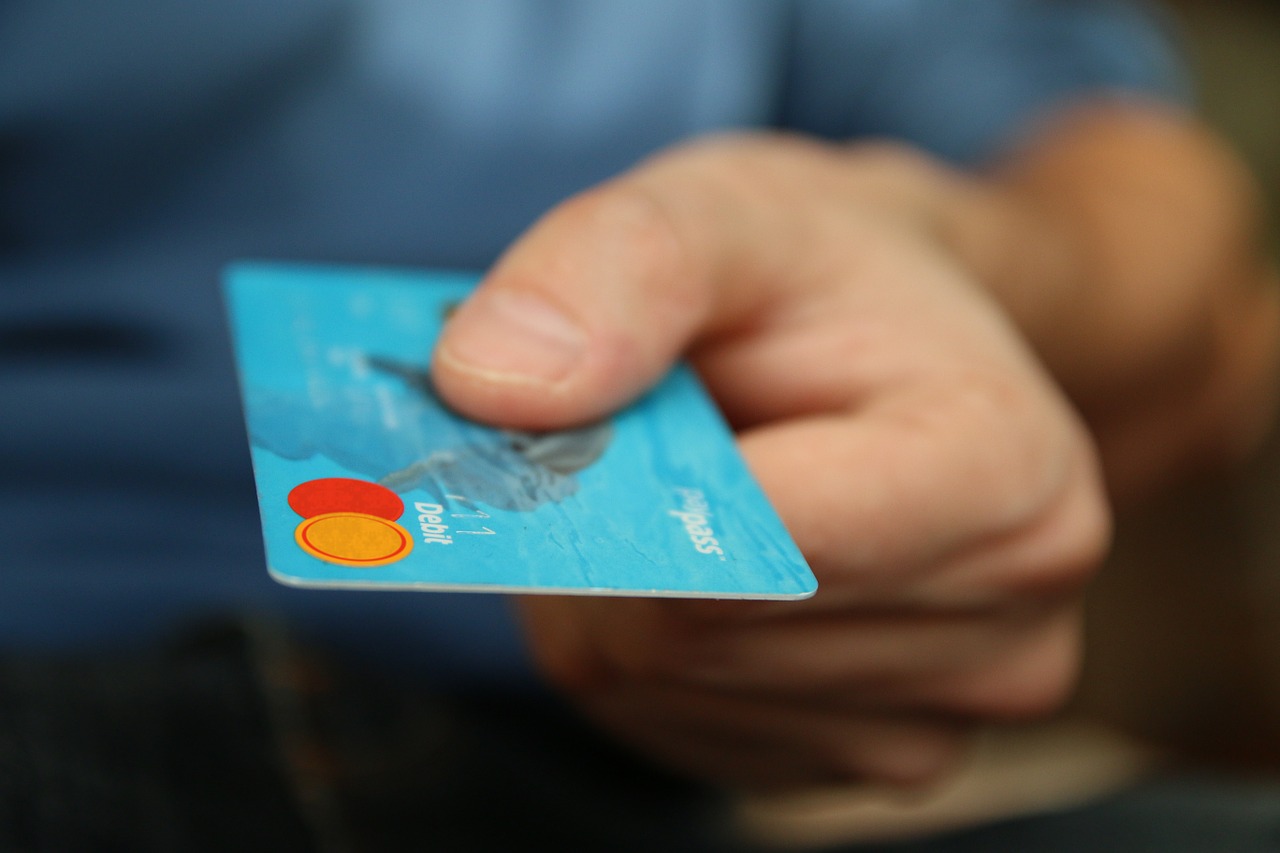 a person holds a credit card