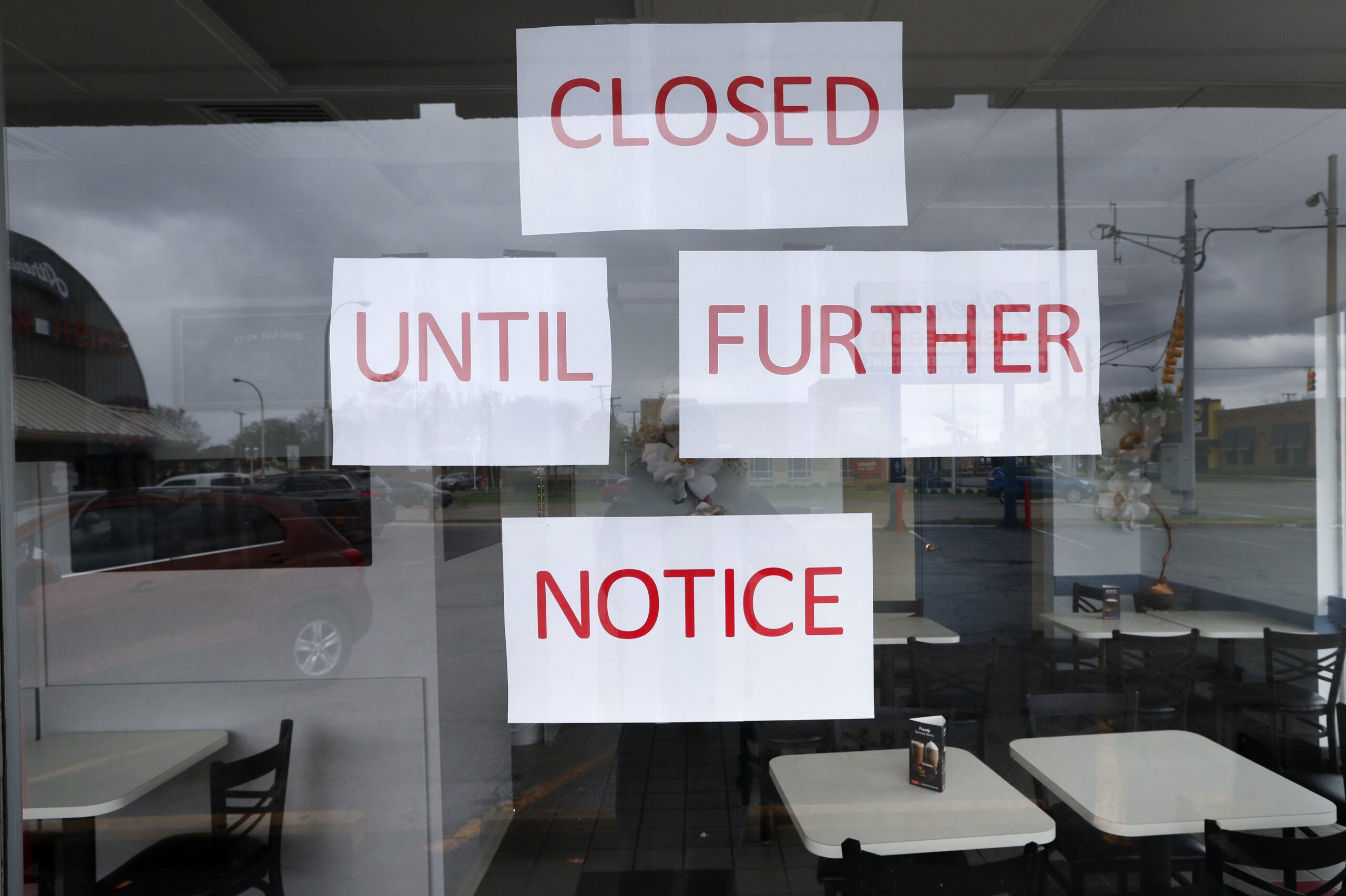 'Closed Until Further Notice' sign at restaurant
