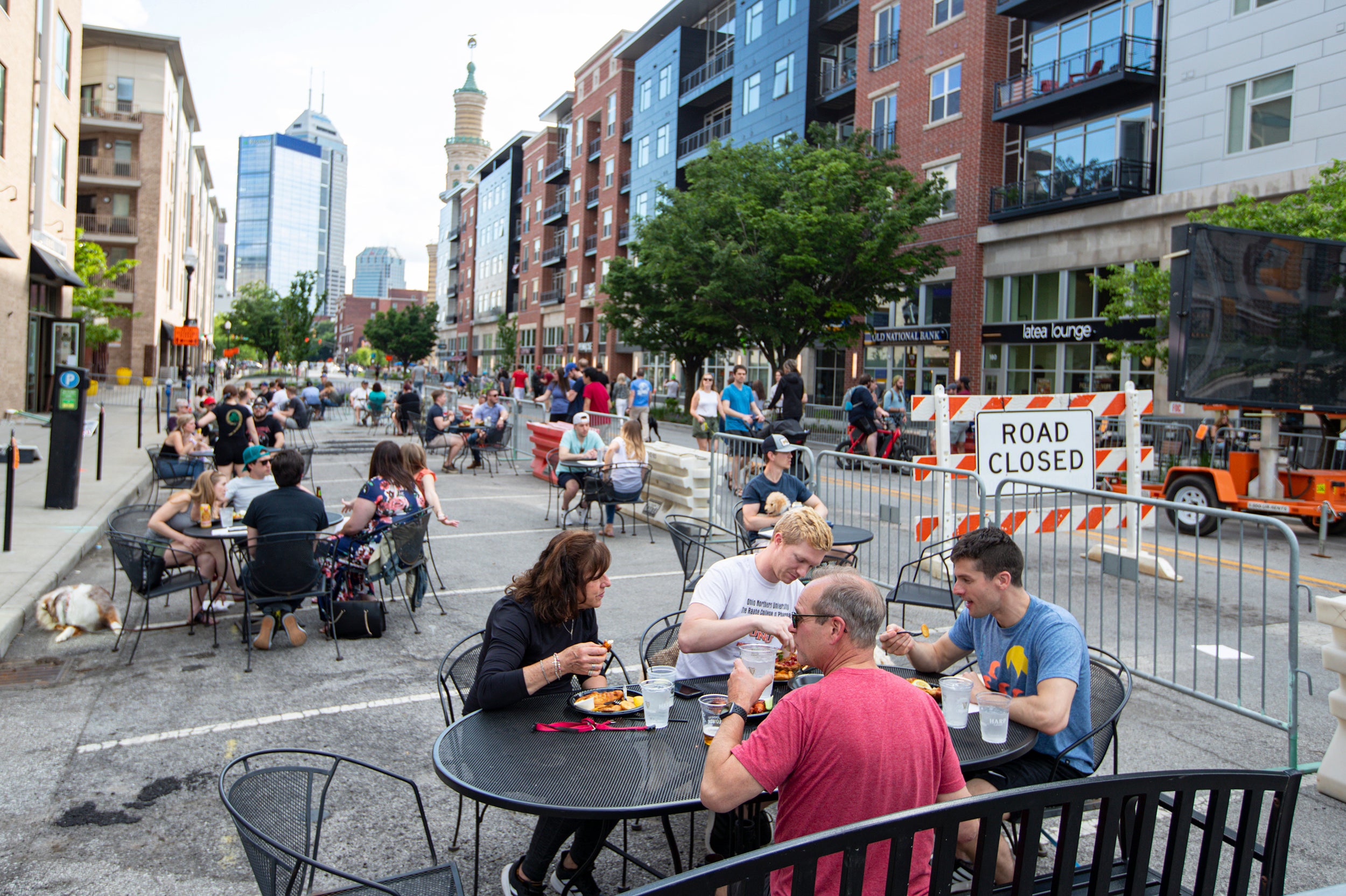 People eating on a restaurant patio