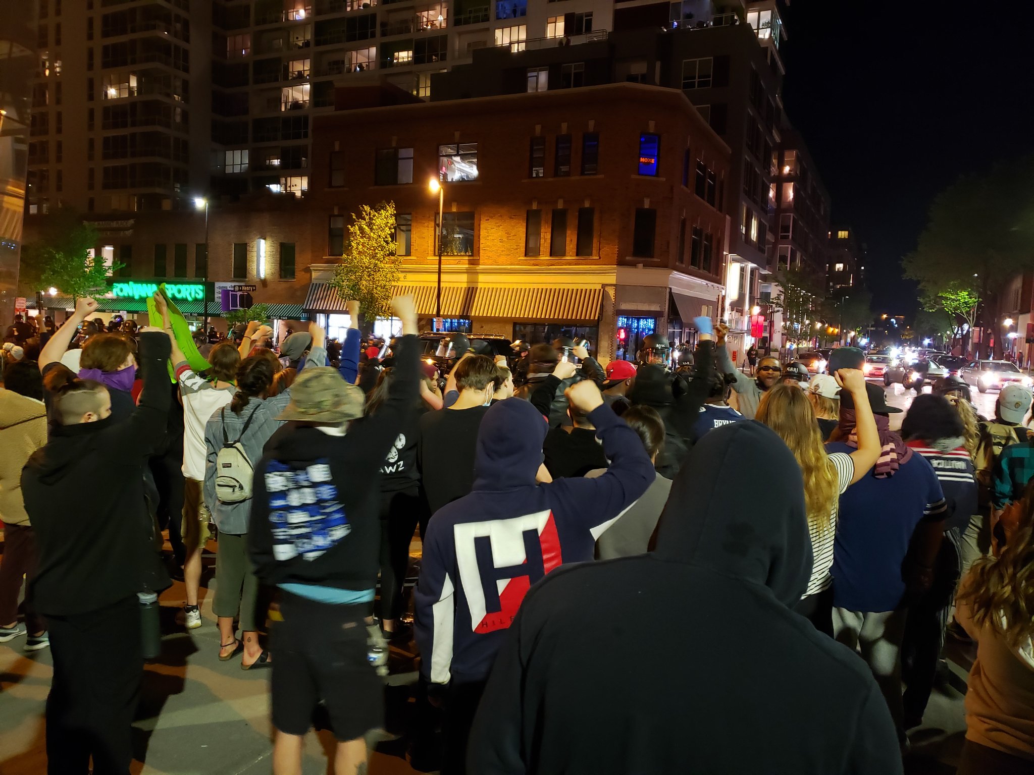 Protesters face off against police Saturday night in downtown Madison.