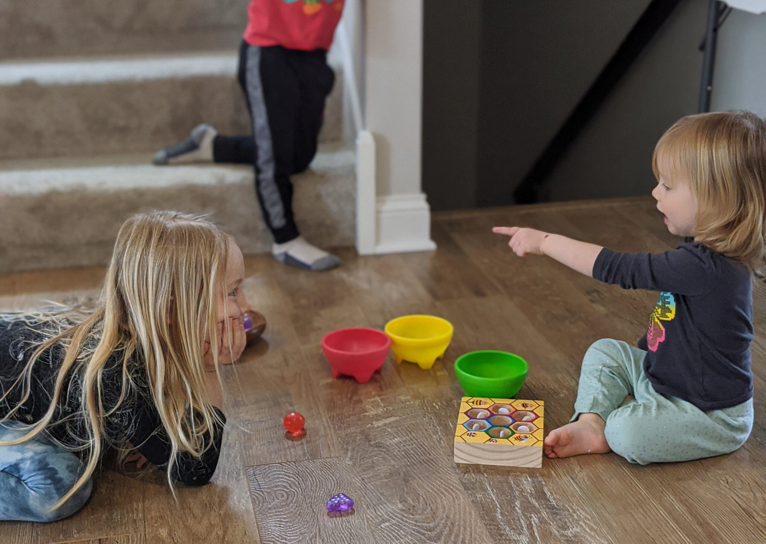 The three Fogarty kids play at home since school was canceled.