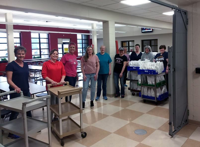 Staff members in cafeteria