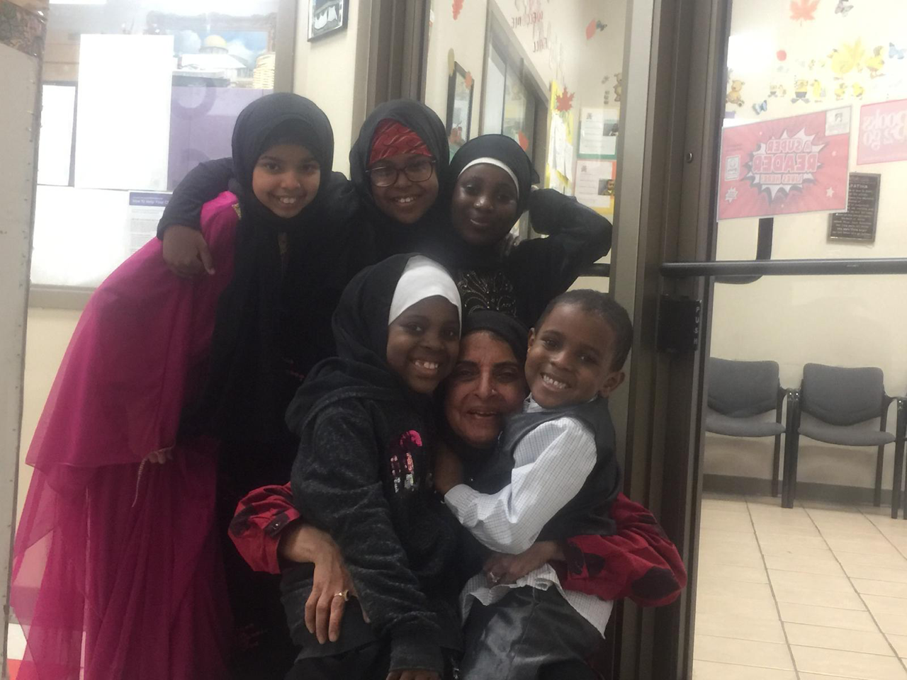 Rafat Arain with children she cares for at Crescent Learning Center in Milwaukee