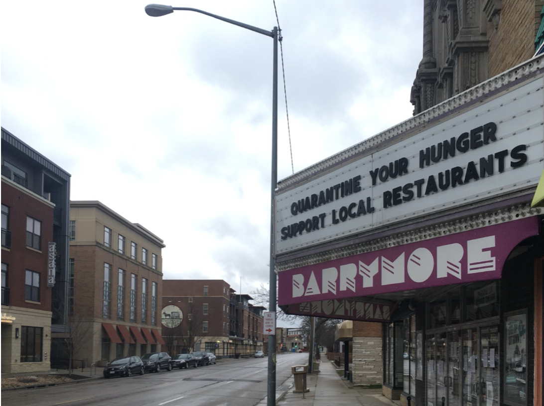 A marquee in Madison reading, Quanranting your hunger: Support local restaurants