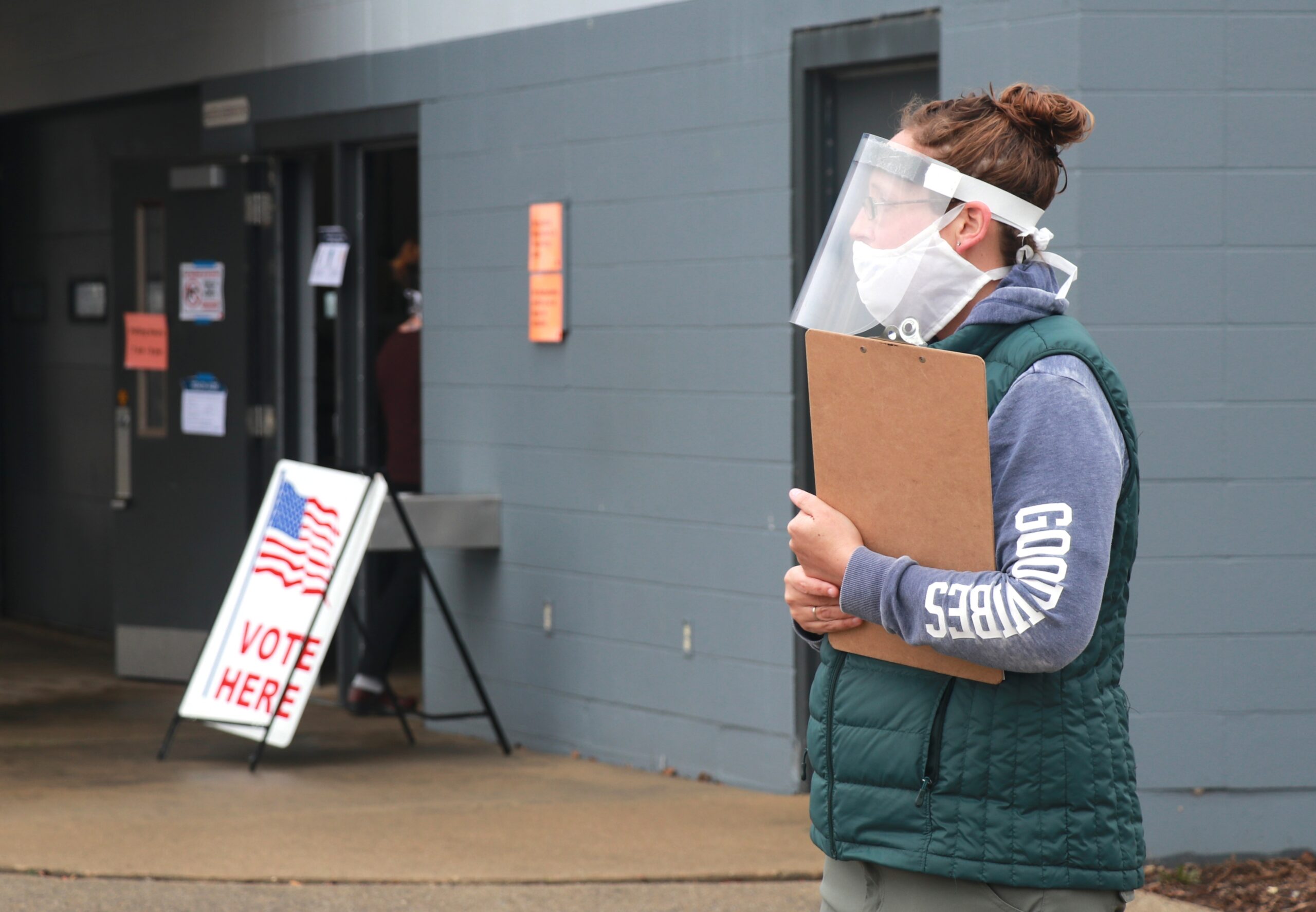Poll worker waits for voters at drive-up location