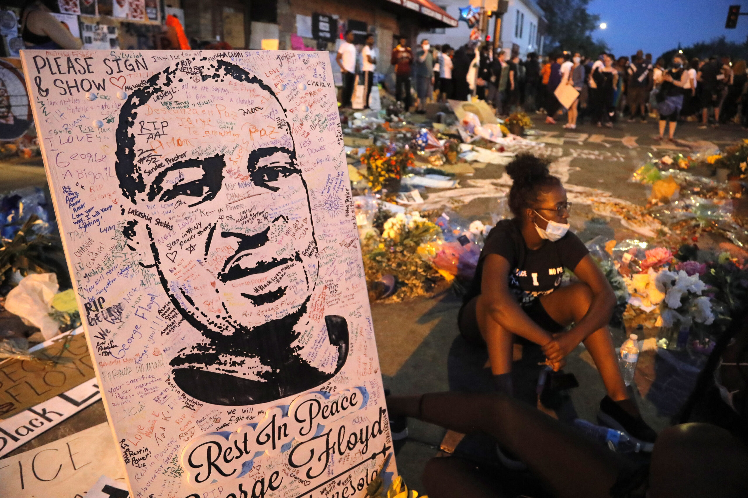 A makeshift memorial is seen at the place where George Floyd died, Monday, June 1, 2020, in Minneapolis.