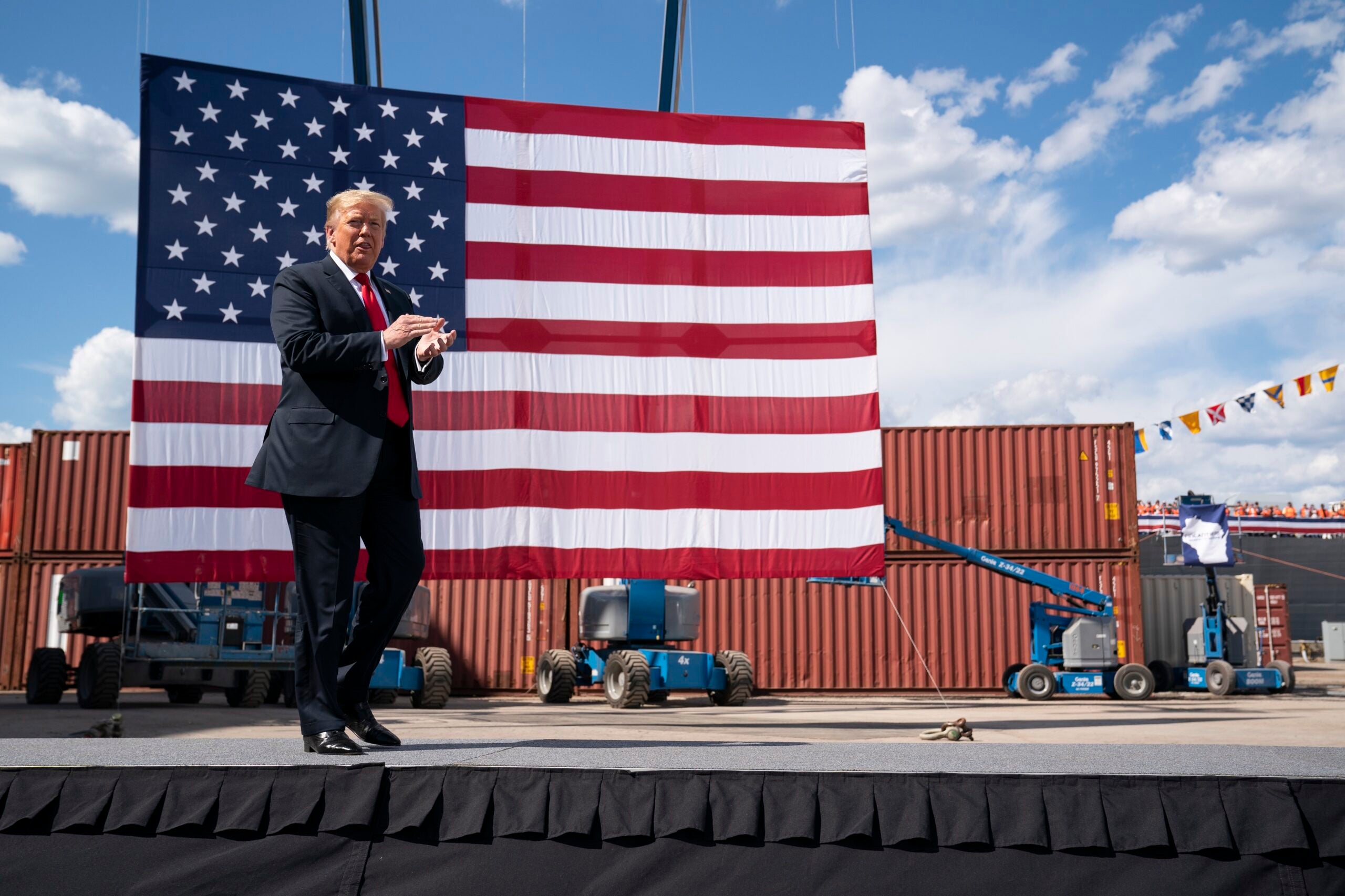President Donald Trump arrives to speak at Fincantieri Marinette Marine