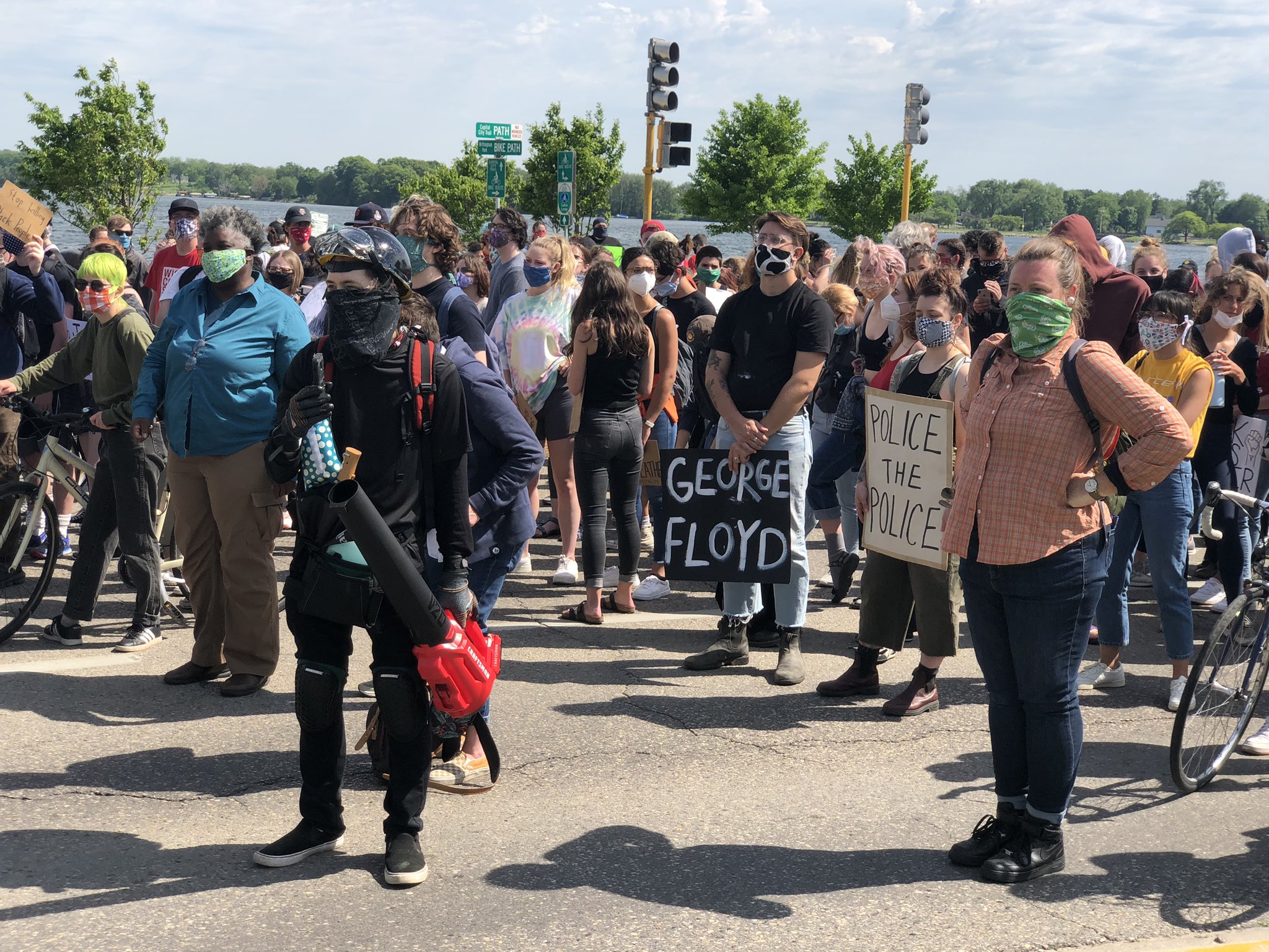 Protesters rallied on John Nolen Drive in Madison on Monday afternoon.