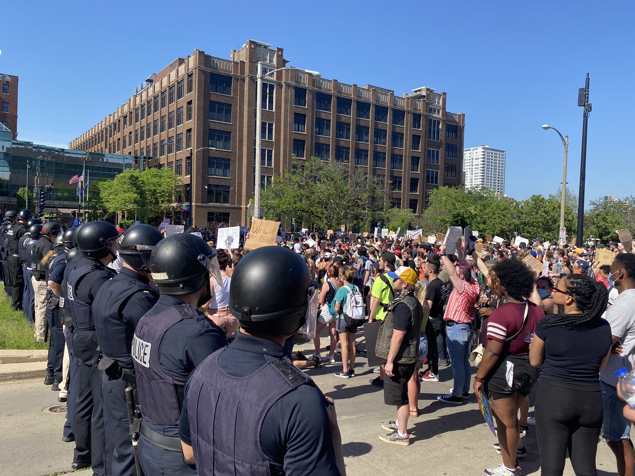 Demonstrators are met by Milwaukee Police after arriving at Milwaukee’s Police Department headquarters