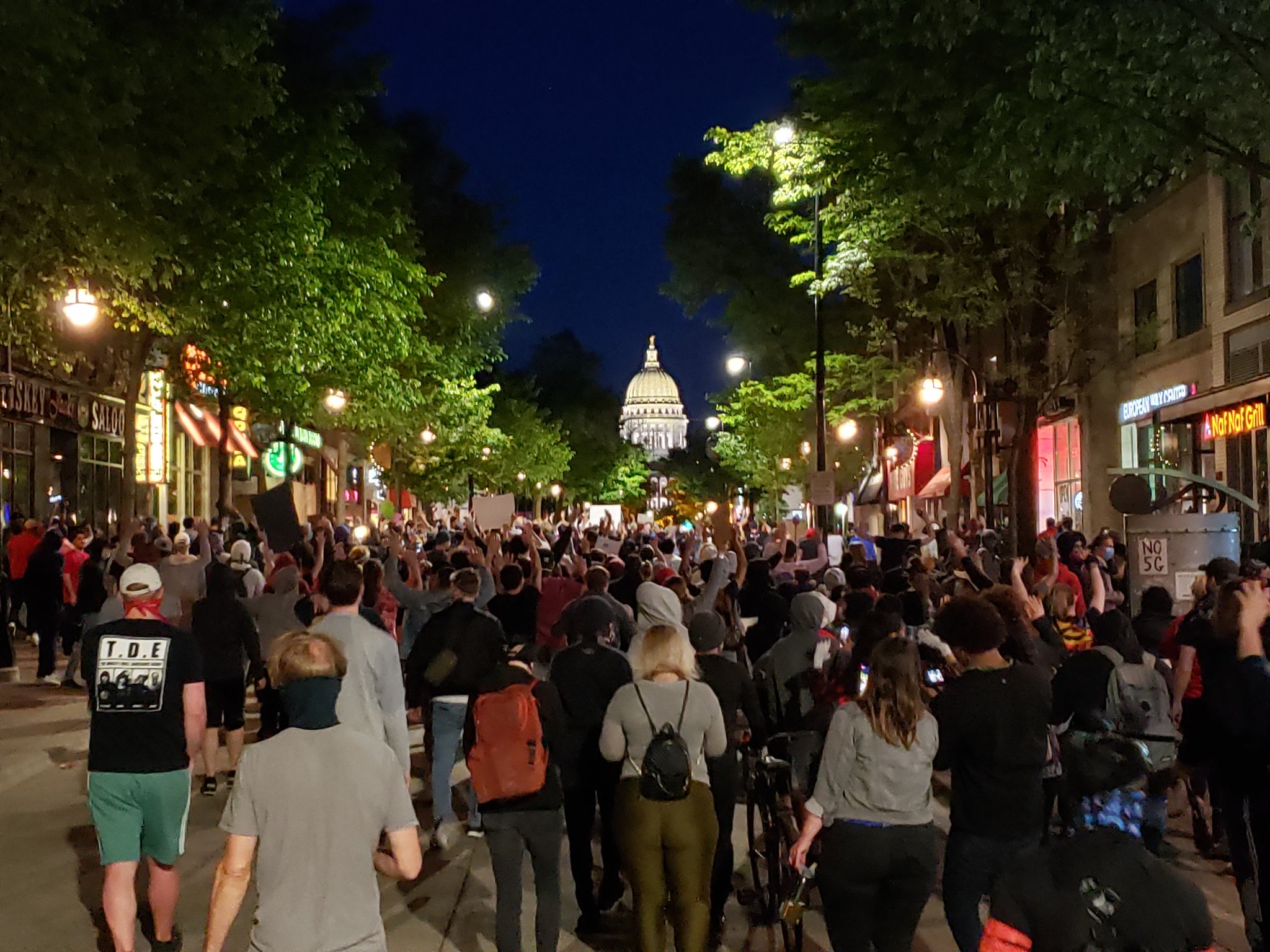 A few hundred protesters returned to State Street in downtown Madison on Sunday night, defying a curfew imposed by the city's mayor.