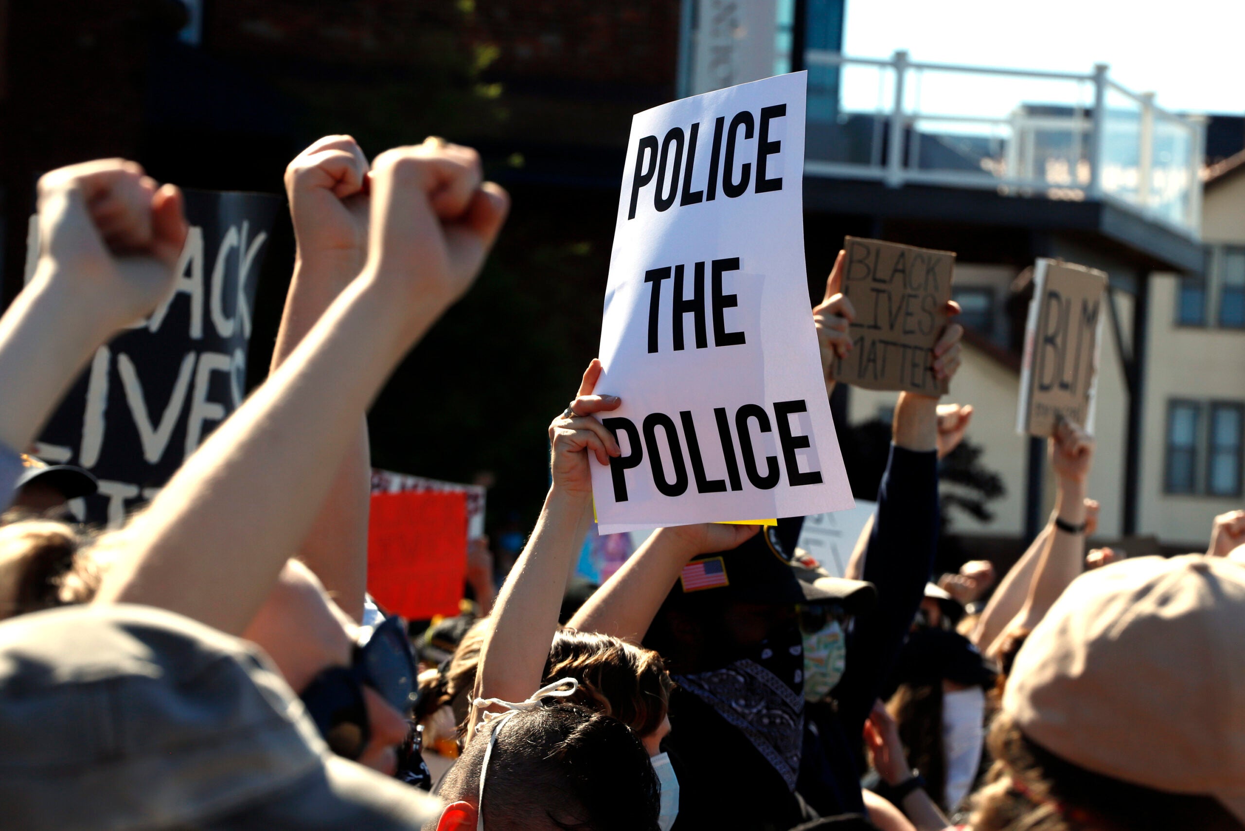 Protesters participate in a Black Lives Matter rally on Mount Washington overlooking downtown Pittsburgh