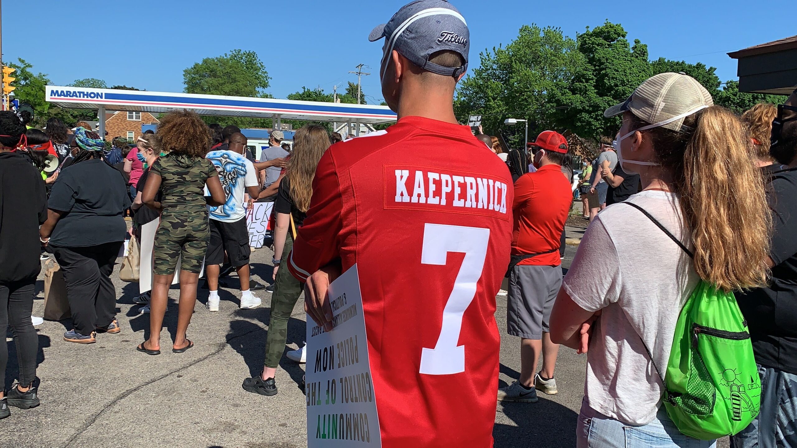 A protester in Wauwatosa wears a Colin Kaepernick jersey