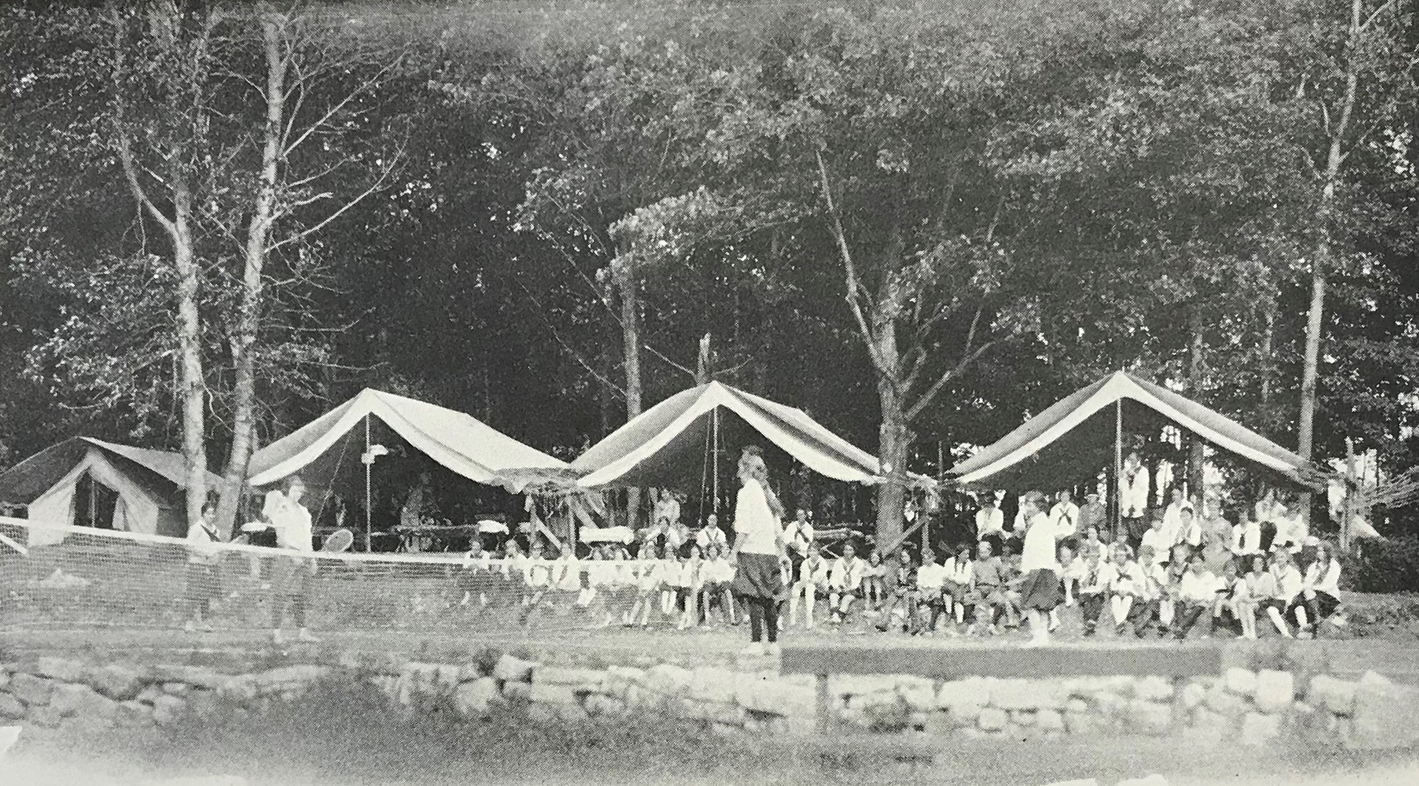 Camp Meenahga's 1928 brochure included an image of a row of canvas tents where the girls slept