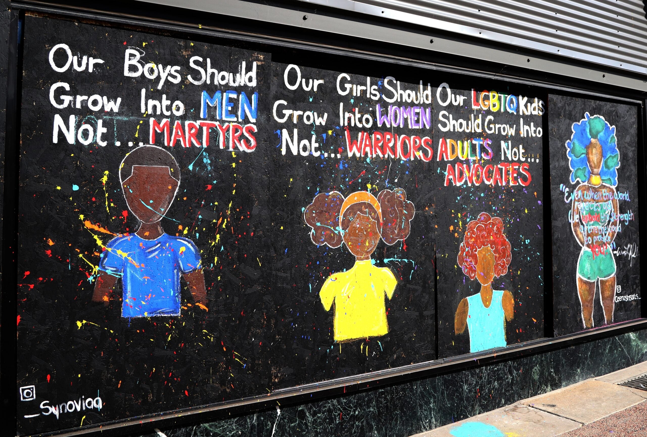 A mural on a State Street business in downtown Madison was painted after the death of George Floyd