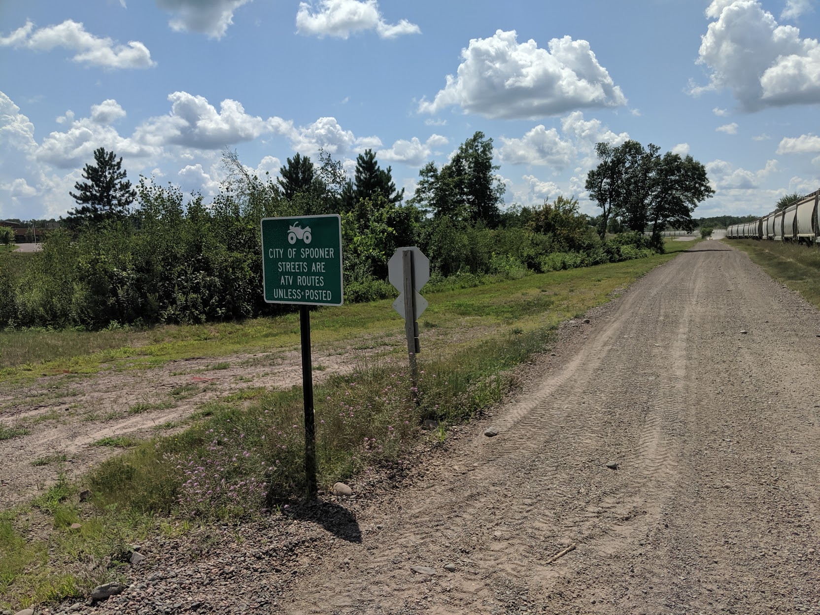 A sign at a trail in Spooner in Washburn County notifies users that ATVs are allowed on city streets unless otherwise posted