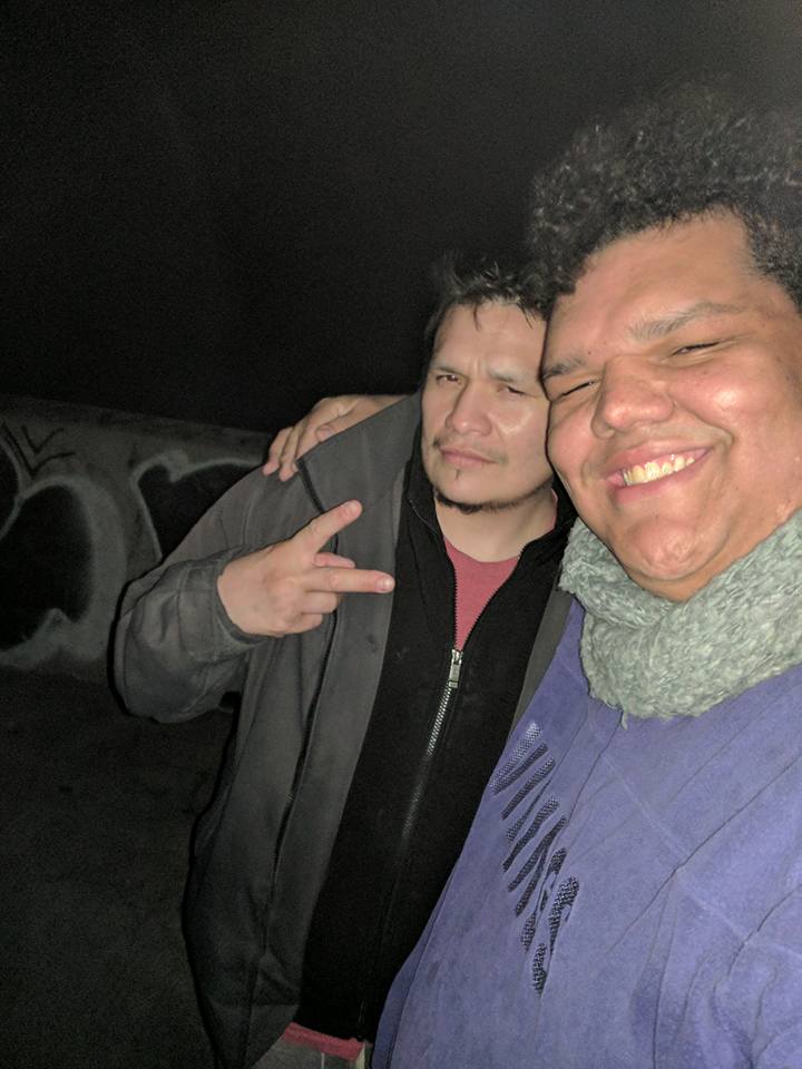 Tiodolo Delagarza, left, and Dosha Joi hang out late at night along Lake Michigan in Milwaukee in April 2017.