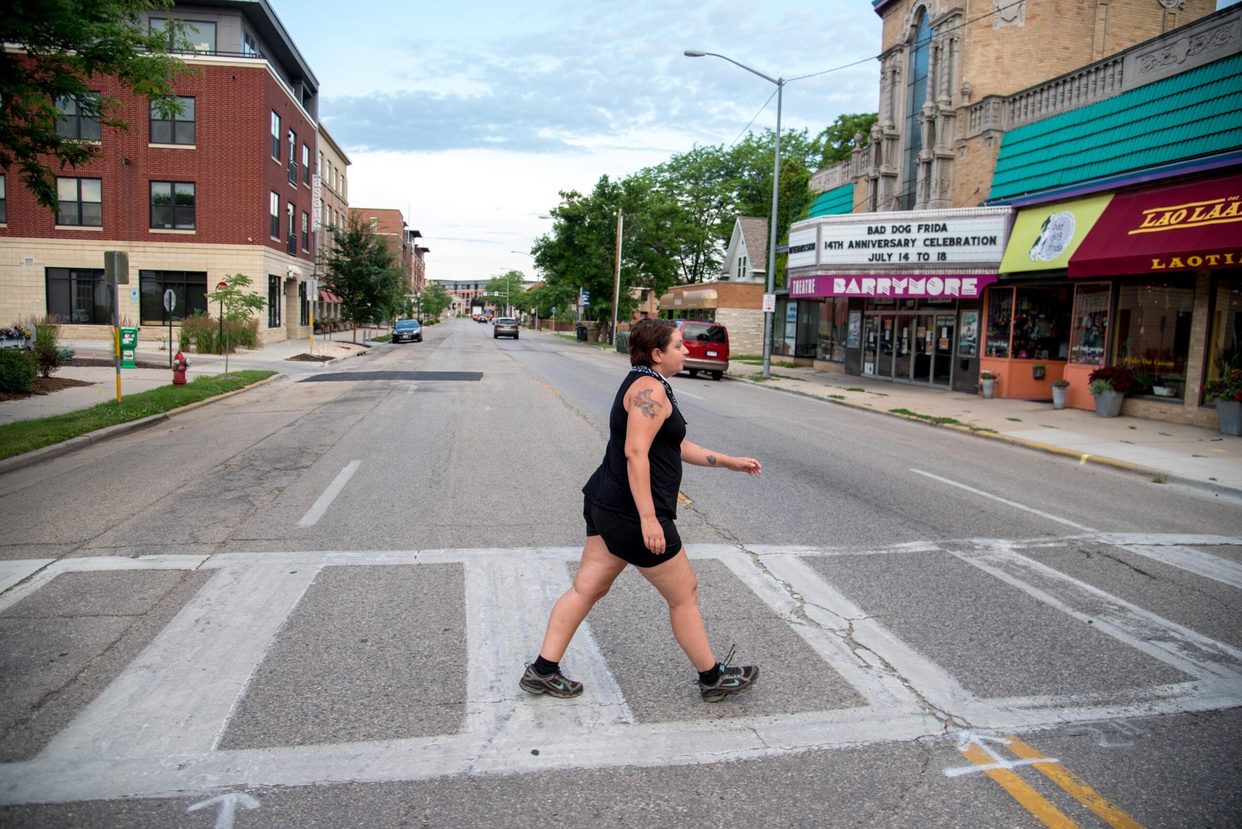 Amy Moreland walking across the street