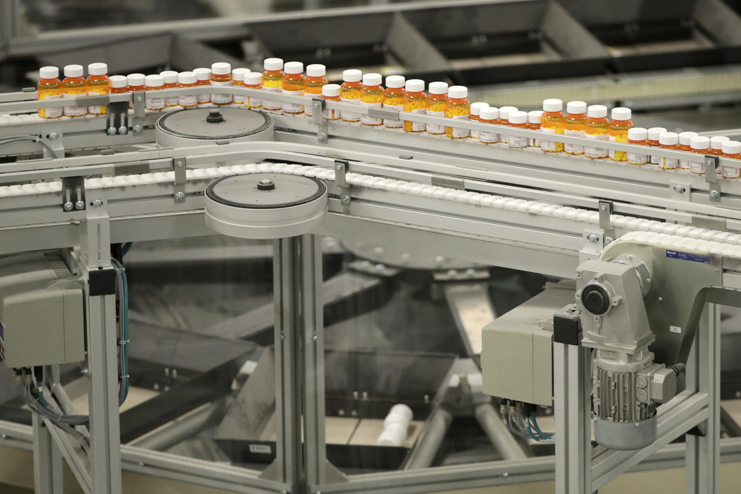 Prescription bottles on a conveyor belt