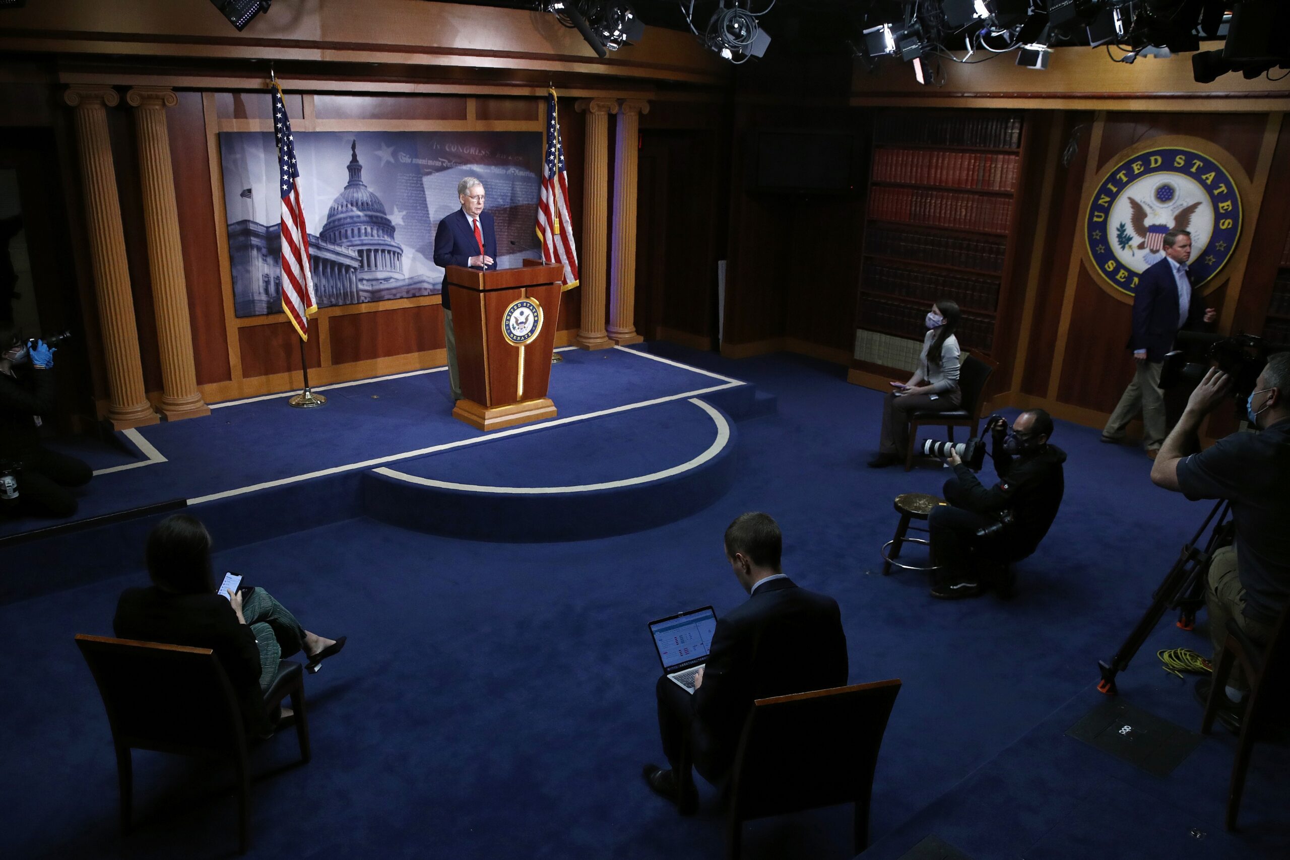 Senator Mitch McConnell speaks to reporters