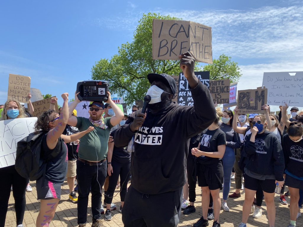 Protesters rally near the Fiserv Forum in Milwaukee on Sunday afternoon