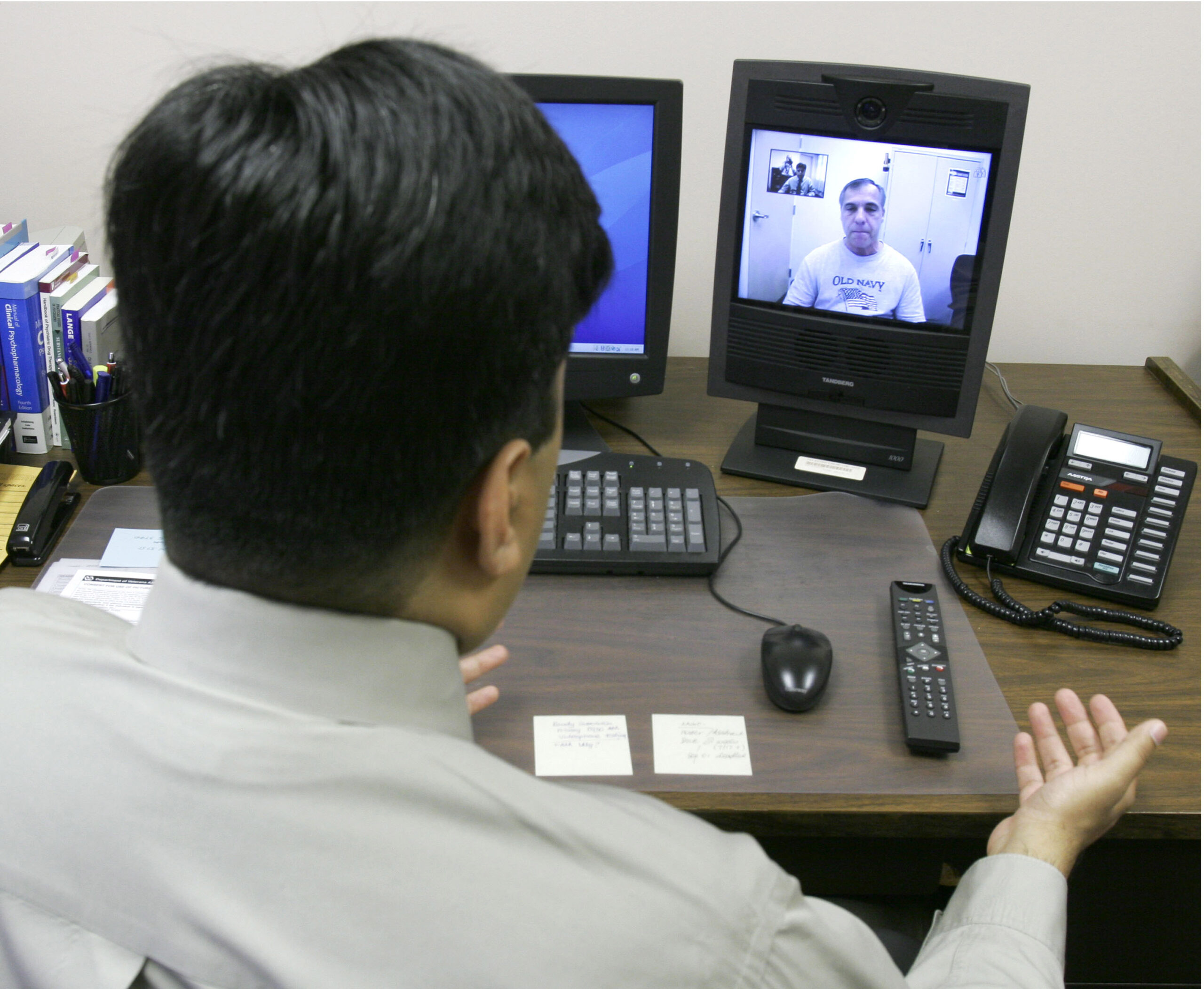 Doctor and patient speak via video conference