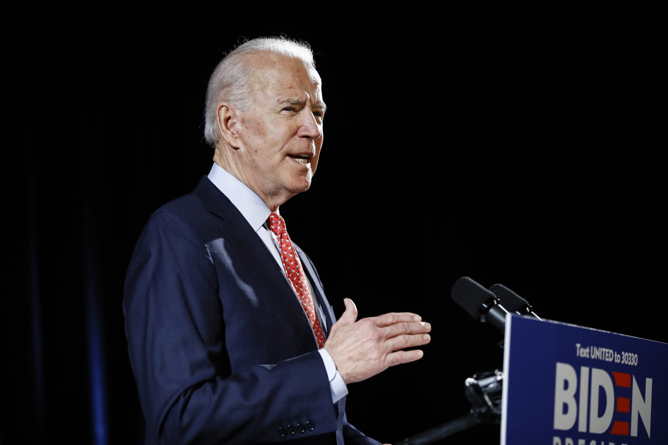 Joe Biden speaks at a podium