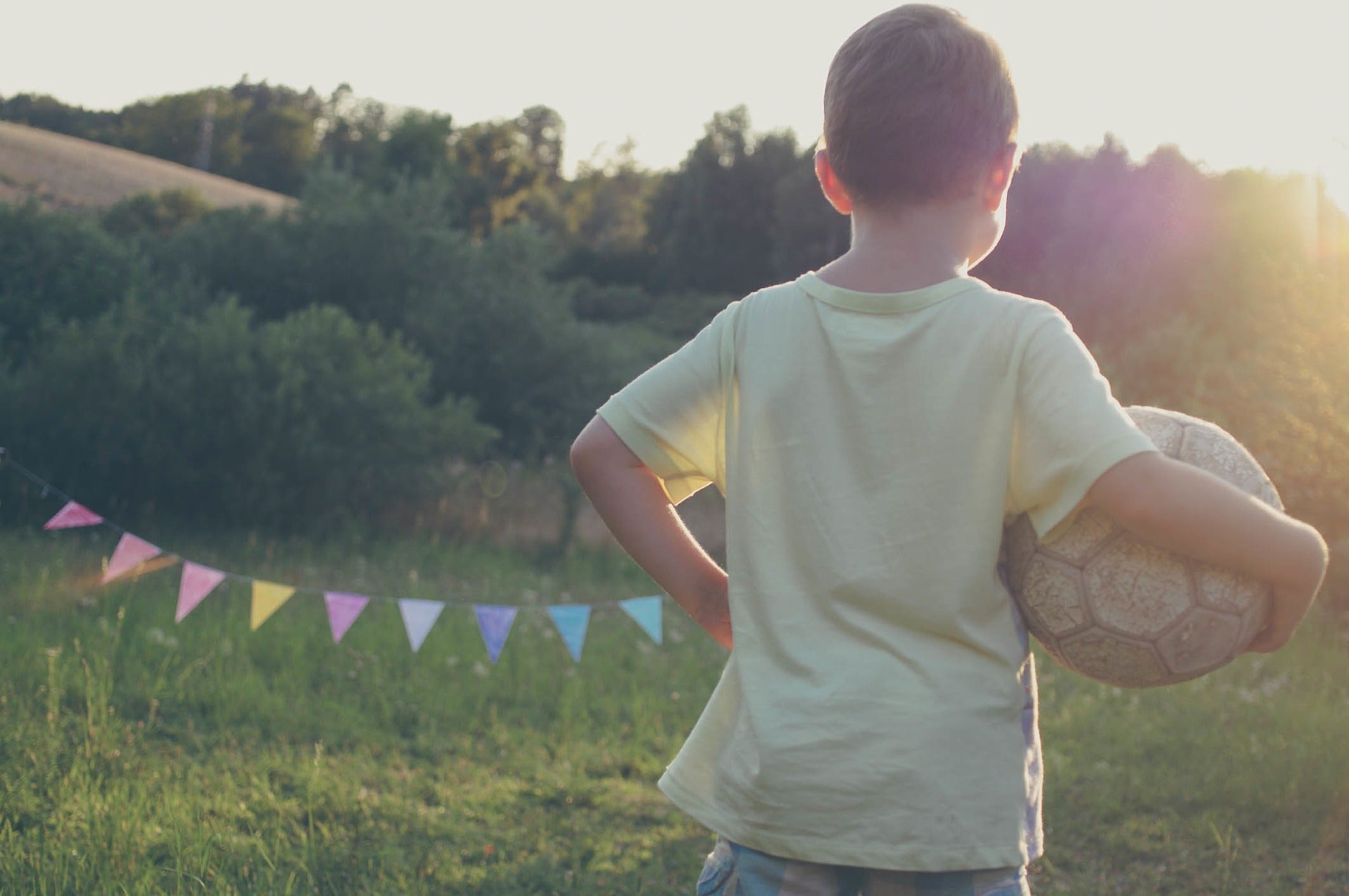 Child with soccer ball.