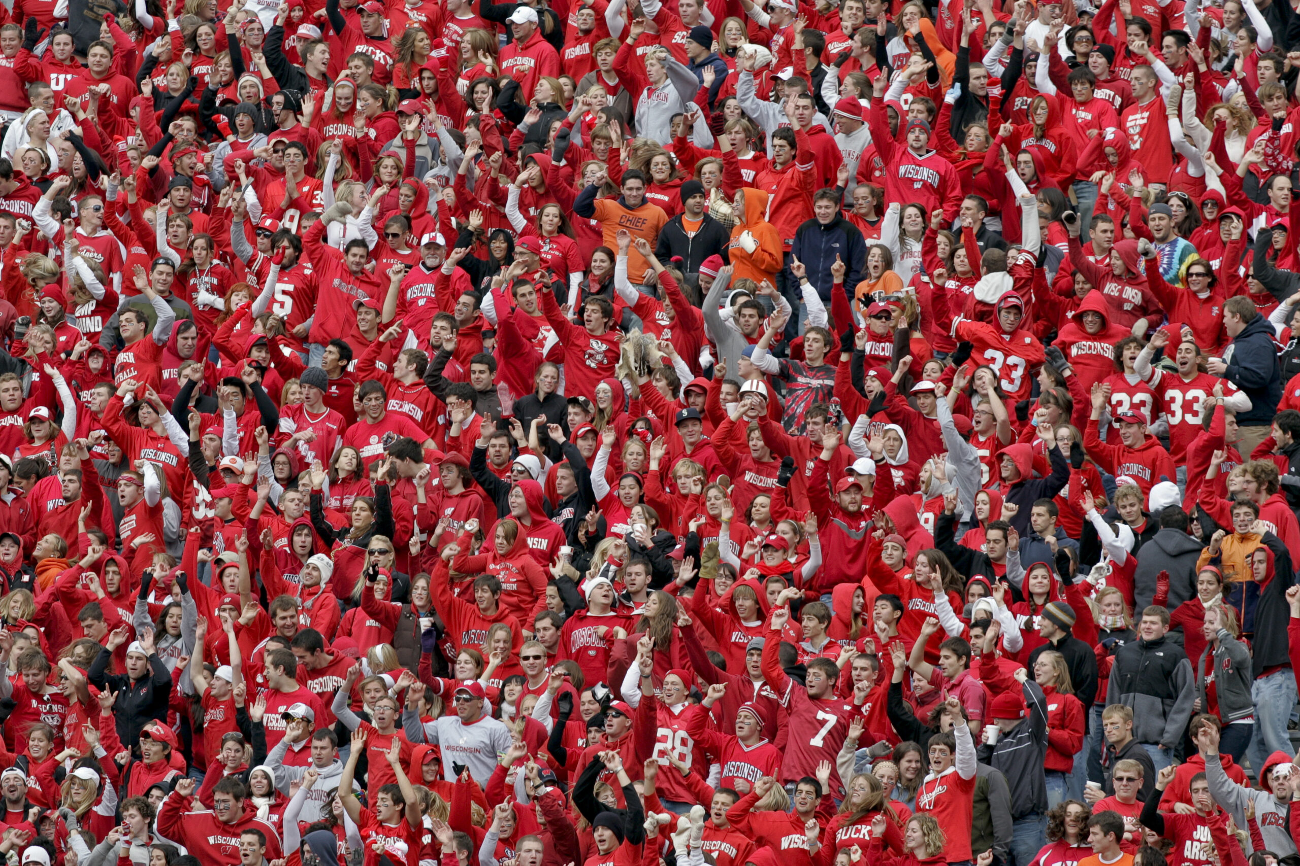 Fans during "Jump Around" at a Wisconsin Badgers football game.
