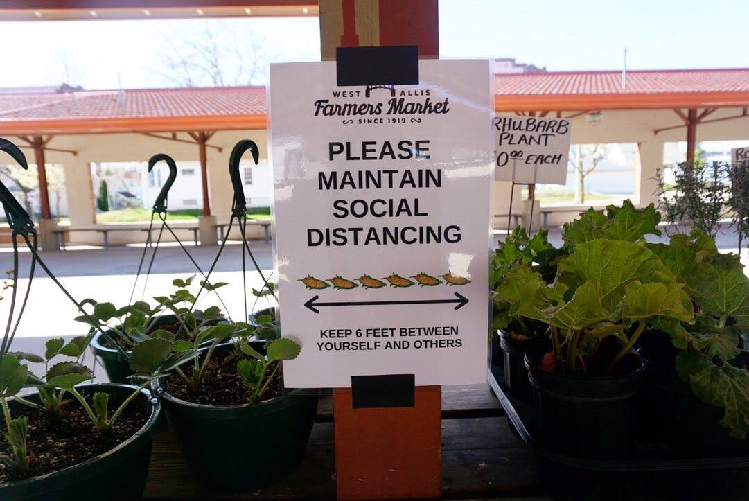 A sign from the opening last weekend of the West Allis Farmers Market
