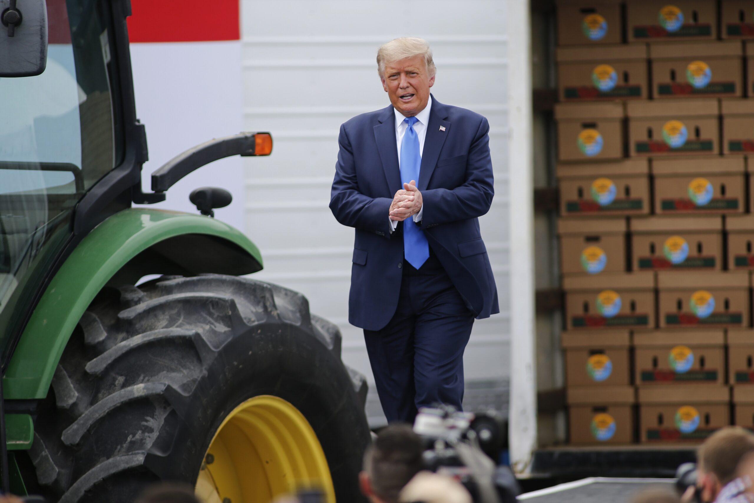 President Donald Trump arrives to deliver remarks on the Farmers to Families Food Box Program in North Carolina