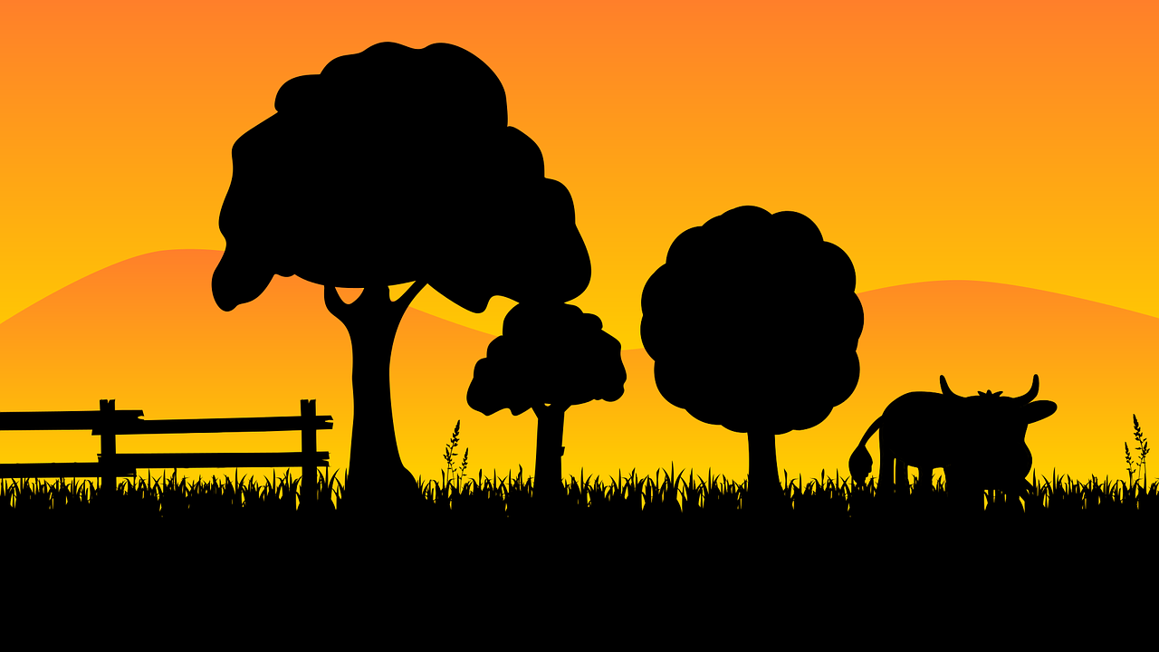 Graphic of trees and a cow in silhouette.