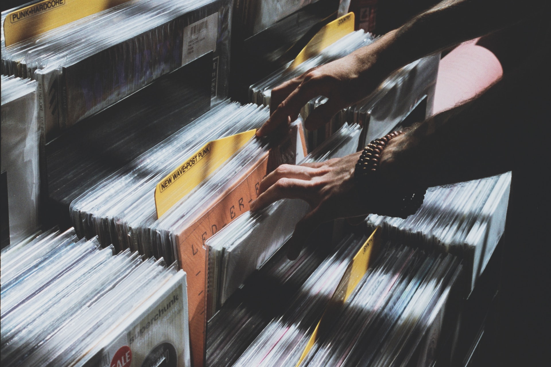 A person looks through vinyl records