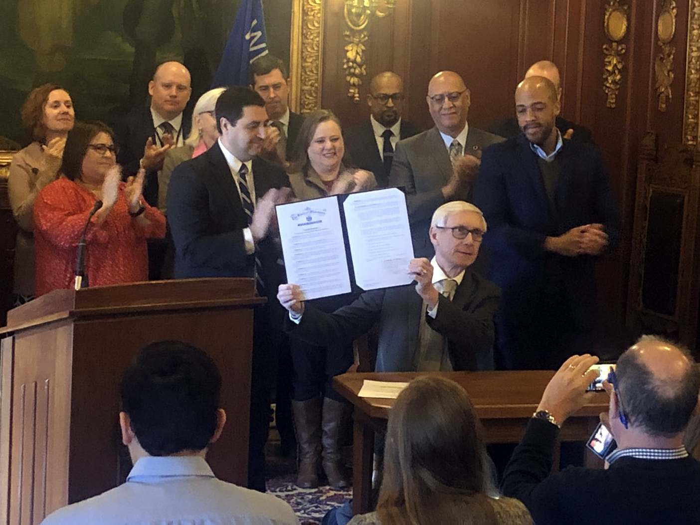 Tony Evers signs an executive order