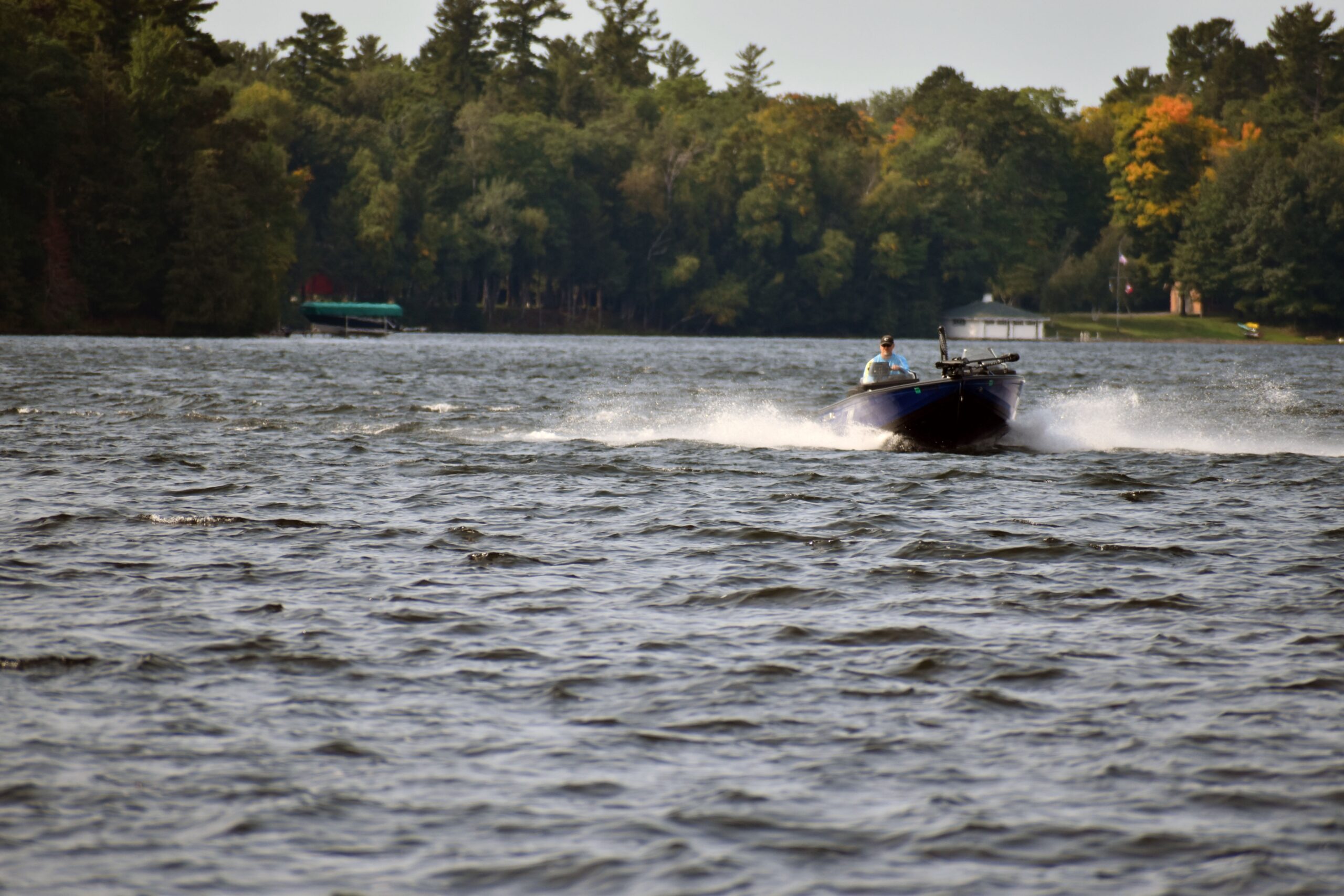 Boater Speeds Across Manitowish Lake