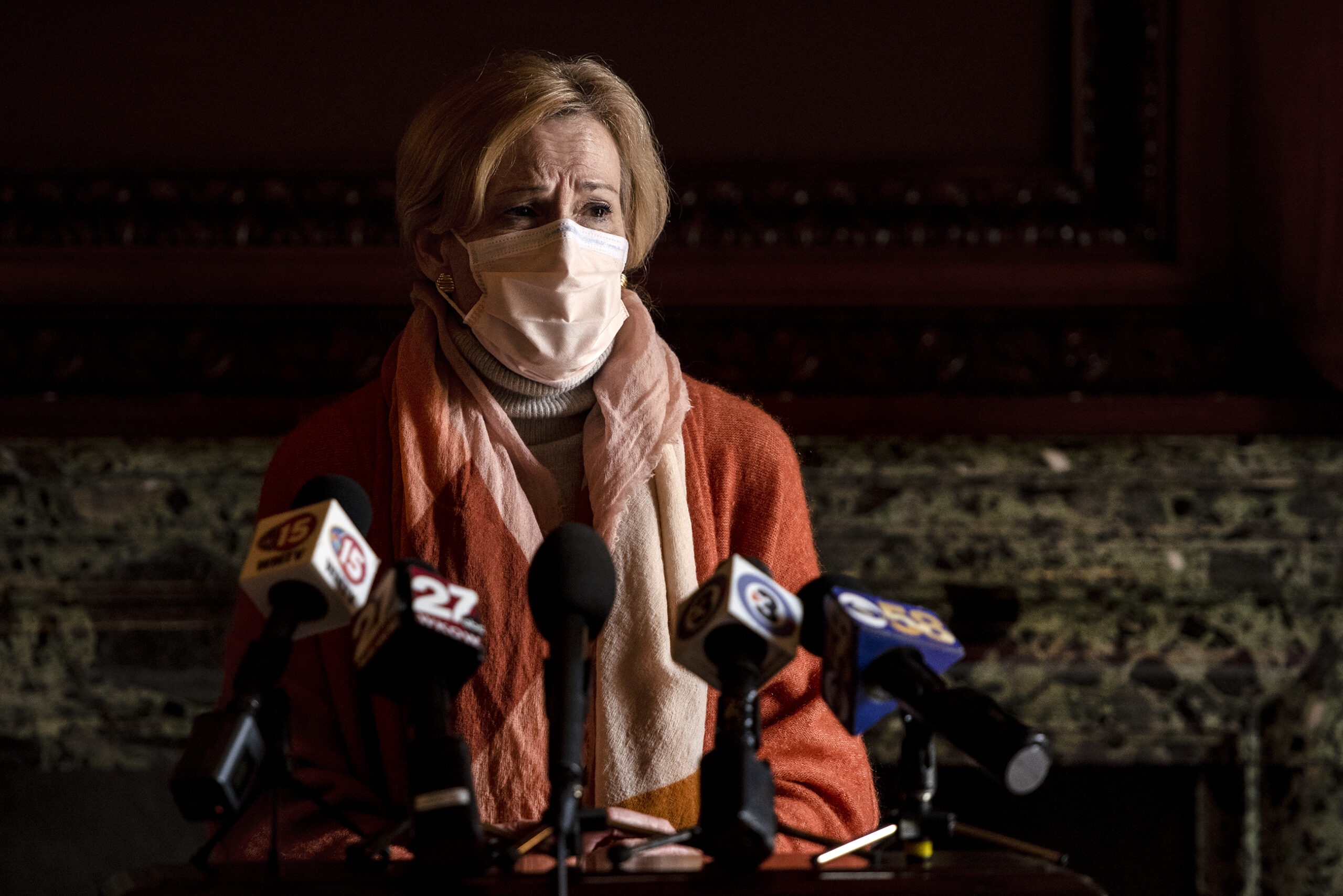 Dr. Deborah Birx wears a mask as she speaks at a lectern