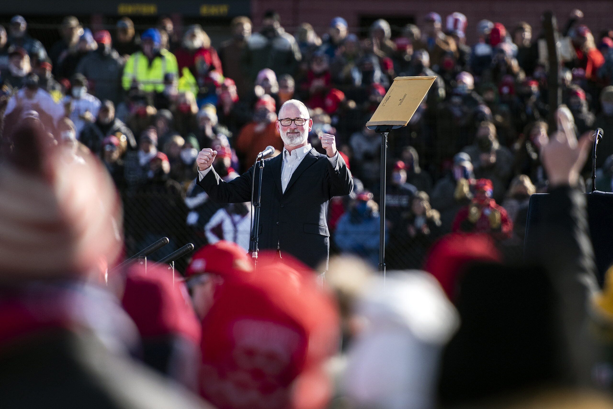 Van Orden raises fists as he enthusiastically speaks to the crowd of Trump supporters