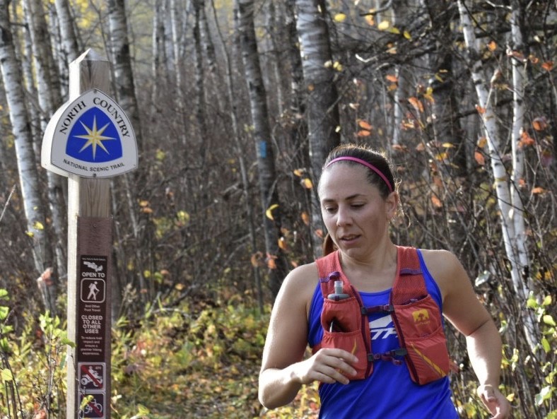 Annie Weiss running the North Country Trail in October 2020
