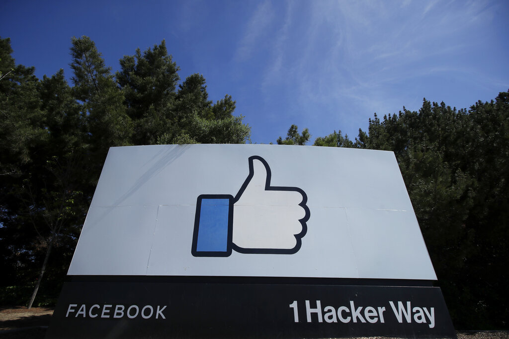The thumbs up Like logo is shown on a sign at Facebook headquarters in Menlo Park, Calif.,