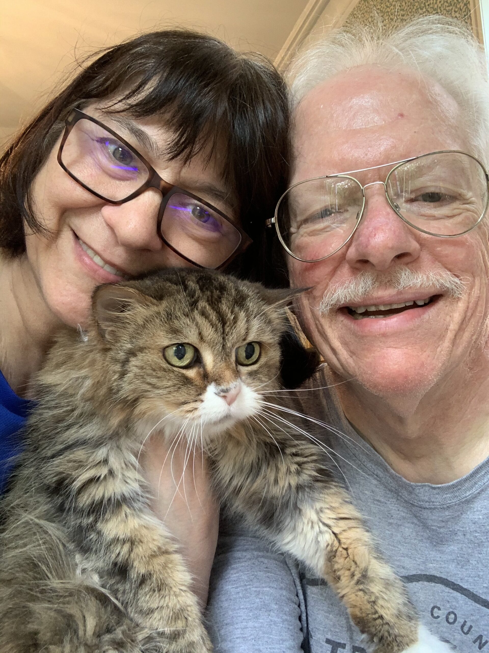 Paul Pratt is pictured with his spouse Denise Chrysler and their pet cat Marbury in this May, 2020 photo.