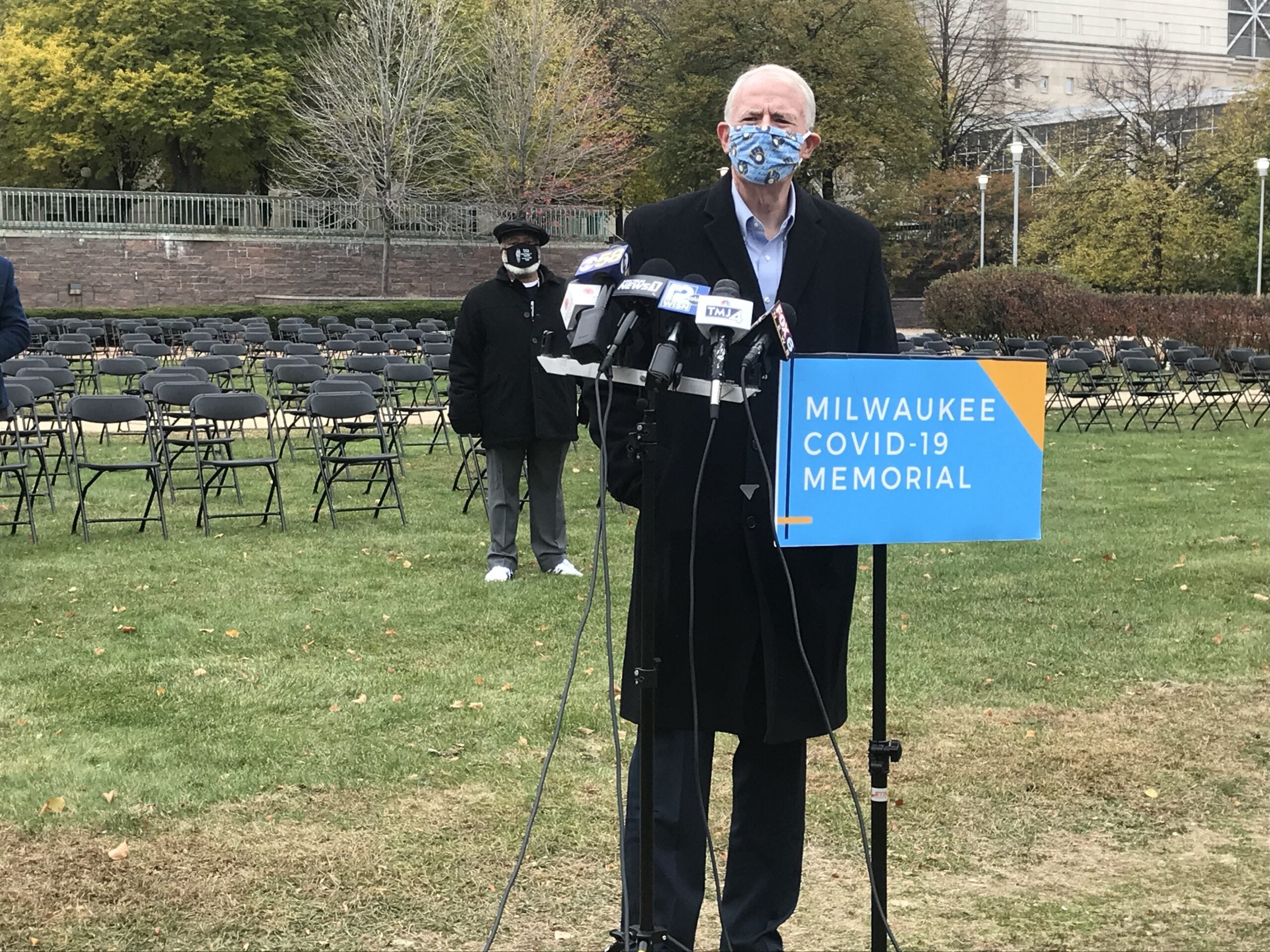 Tom Barrett stands at podium