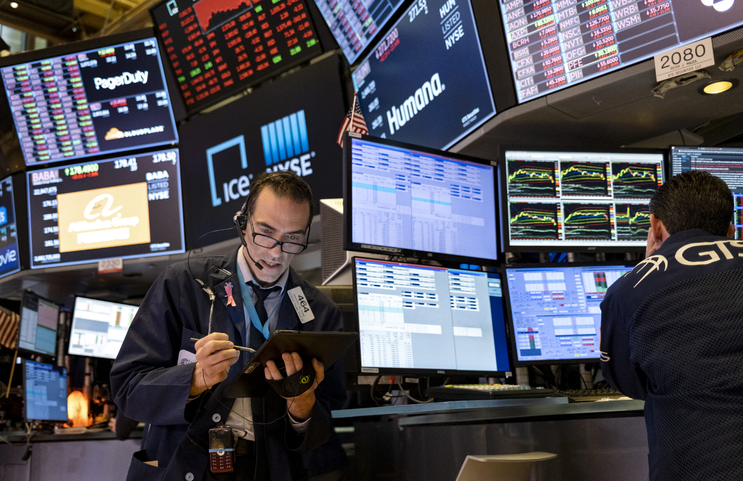 Trader works on the floor of the New York Stock Exchange