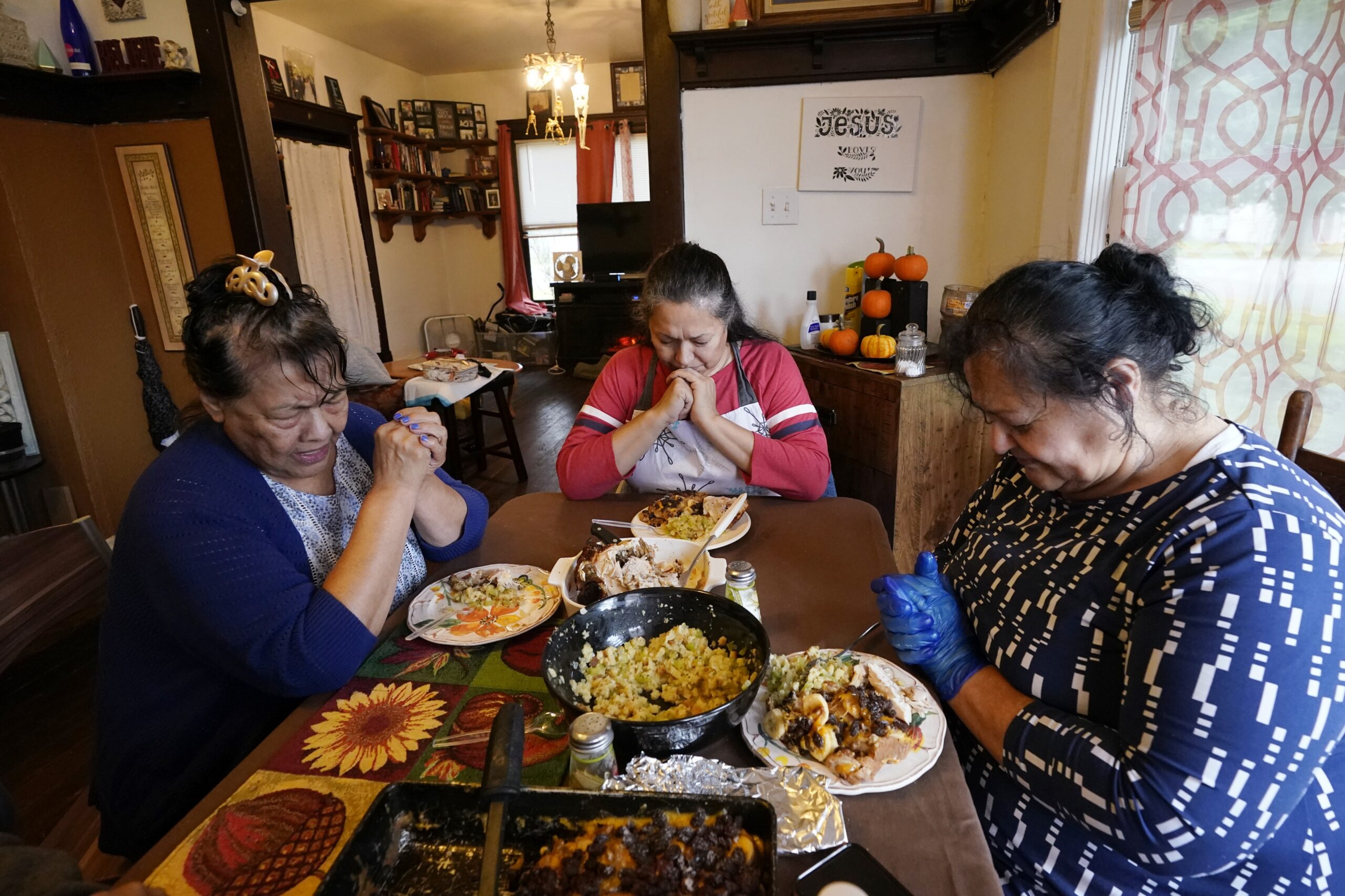 A family celebrates a meal ahead of Thanksgiving