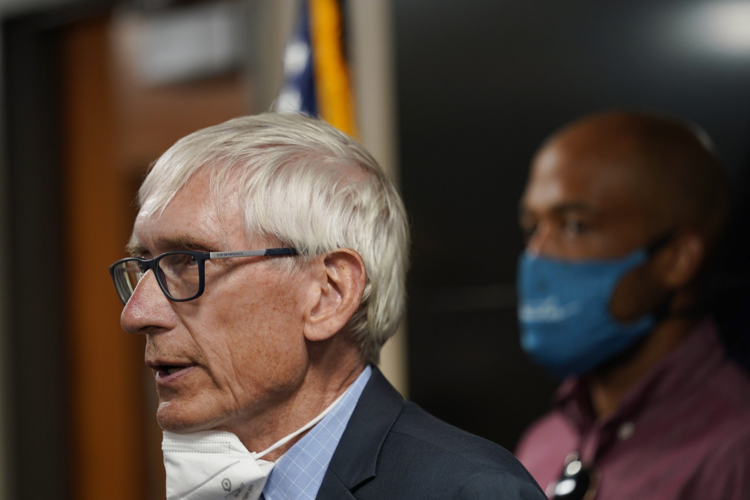 Tony Evers speaks during a news conference