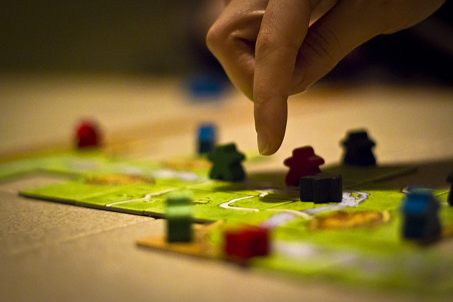 someone plays a tabletop board game