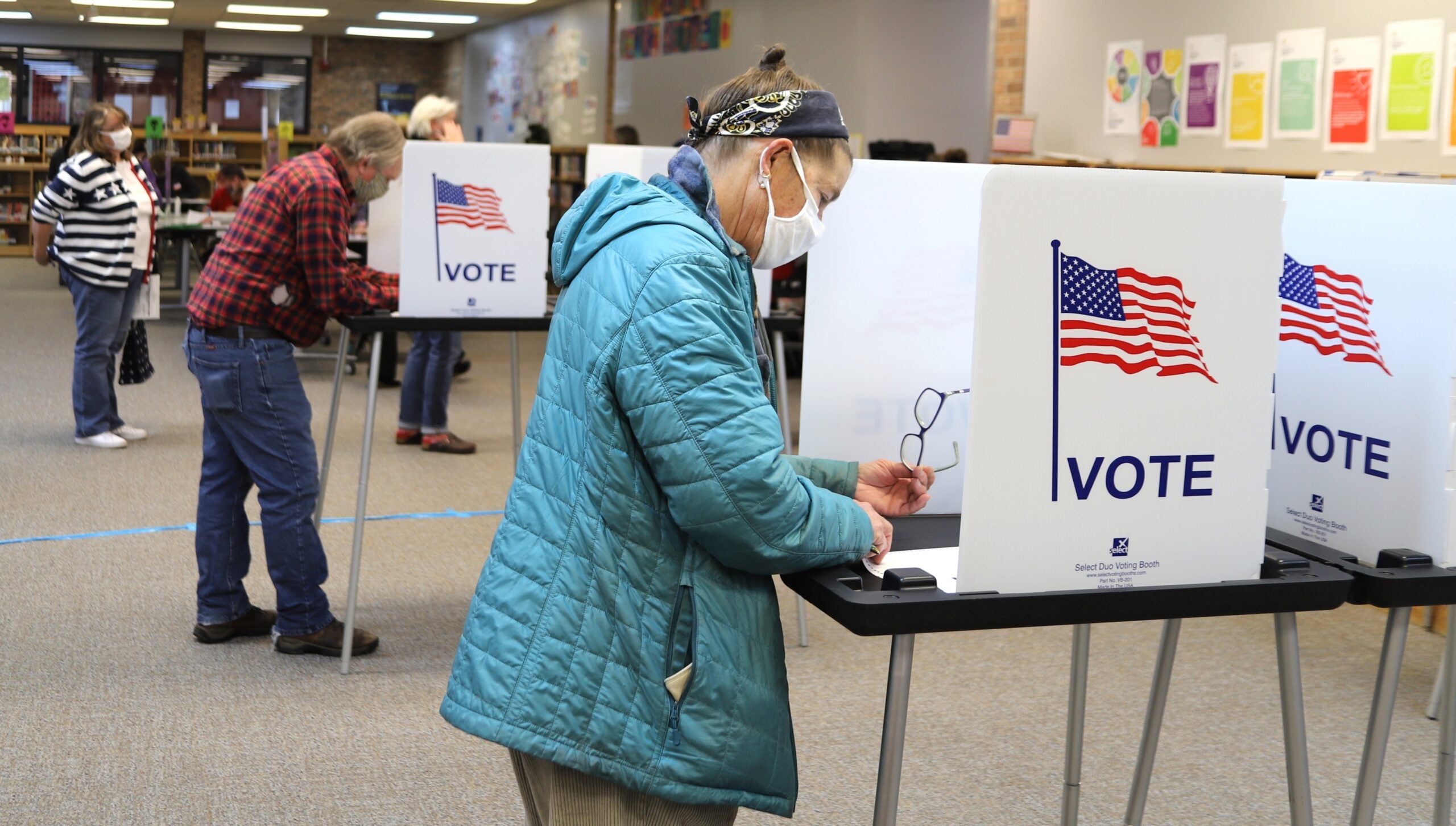 Voters fill out their ballots at Blackhawk Middle School on Madison's north side on Nov. 3, 2020