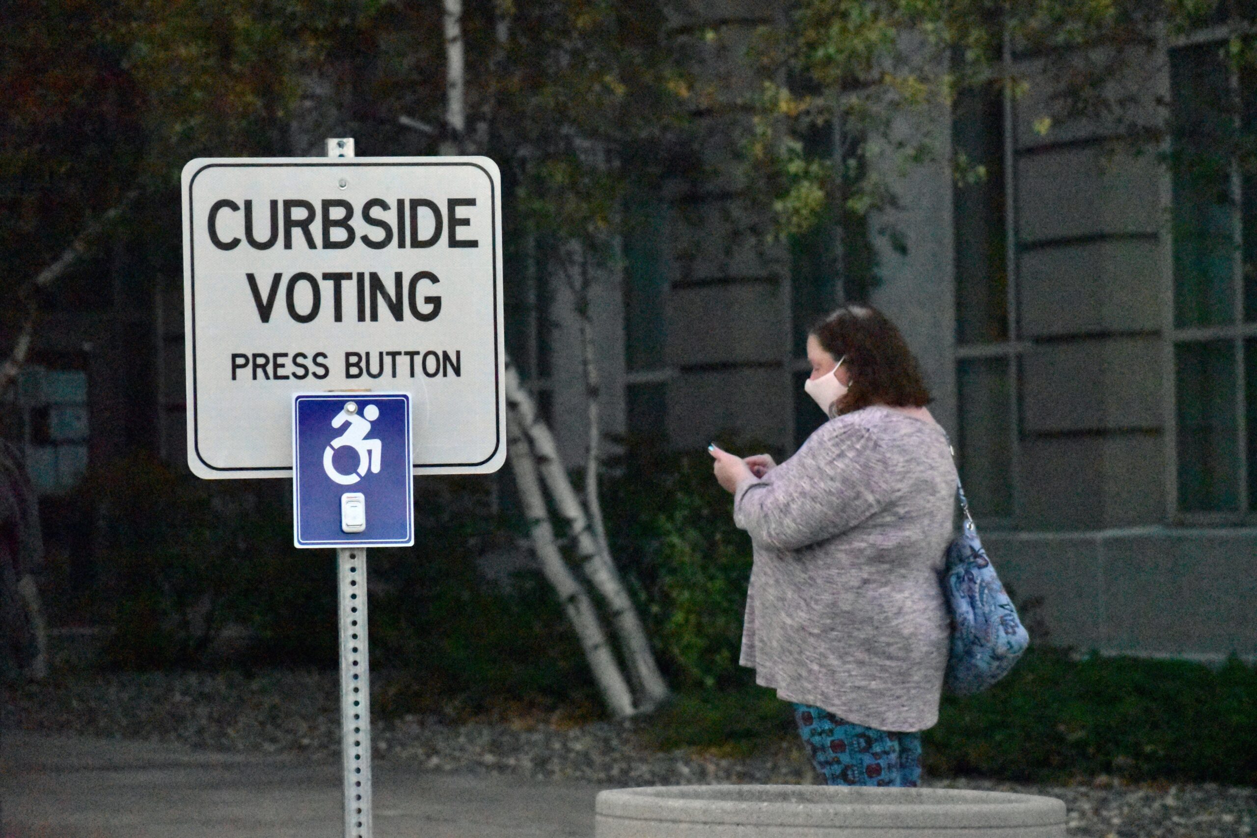Woman Waits In Line To Vote On 2020 Election Day