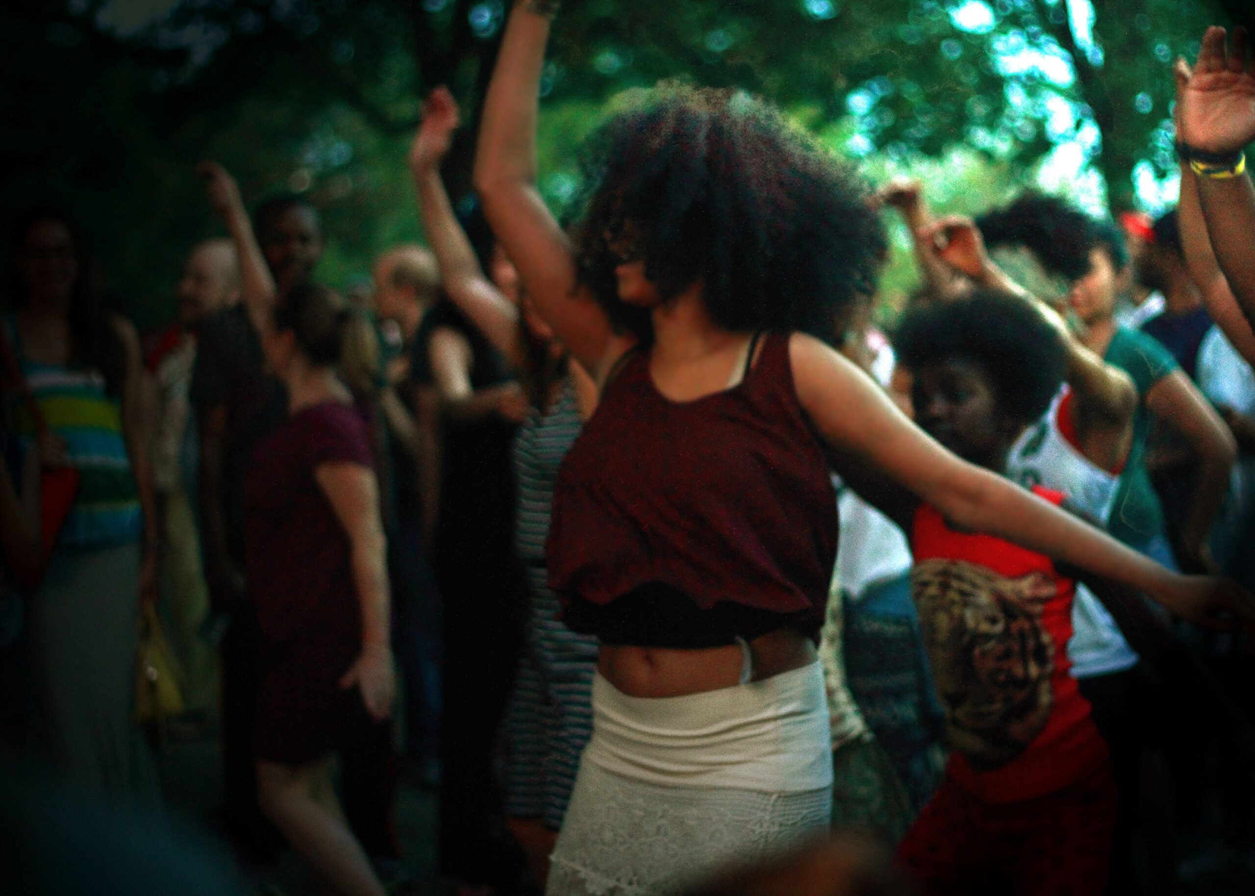 Person dancing in a crowd