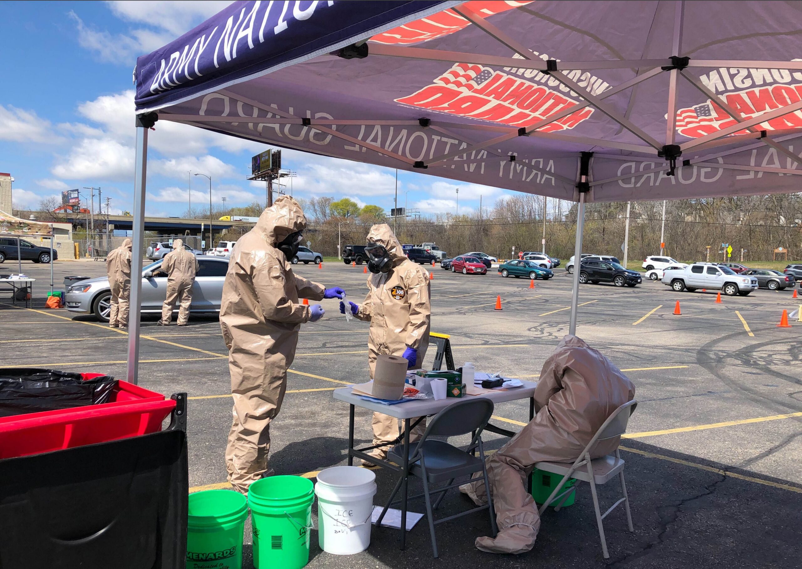 Members of the Wisconsin National Guard administere COVID-19 tests