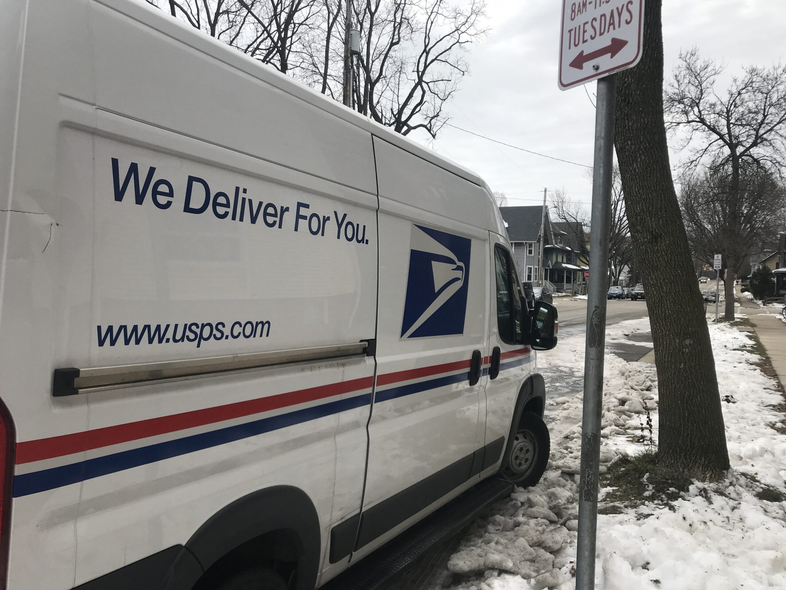 A parked U.S. Postal Service van